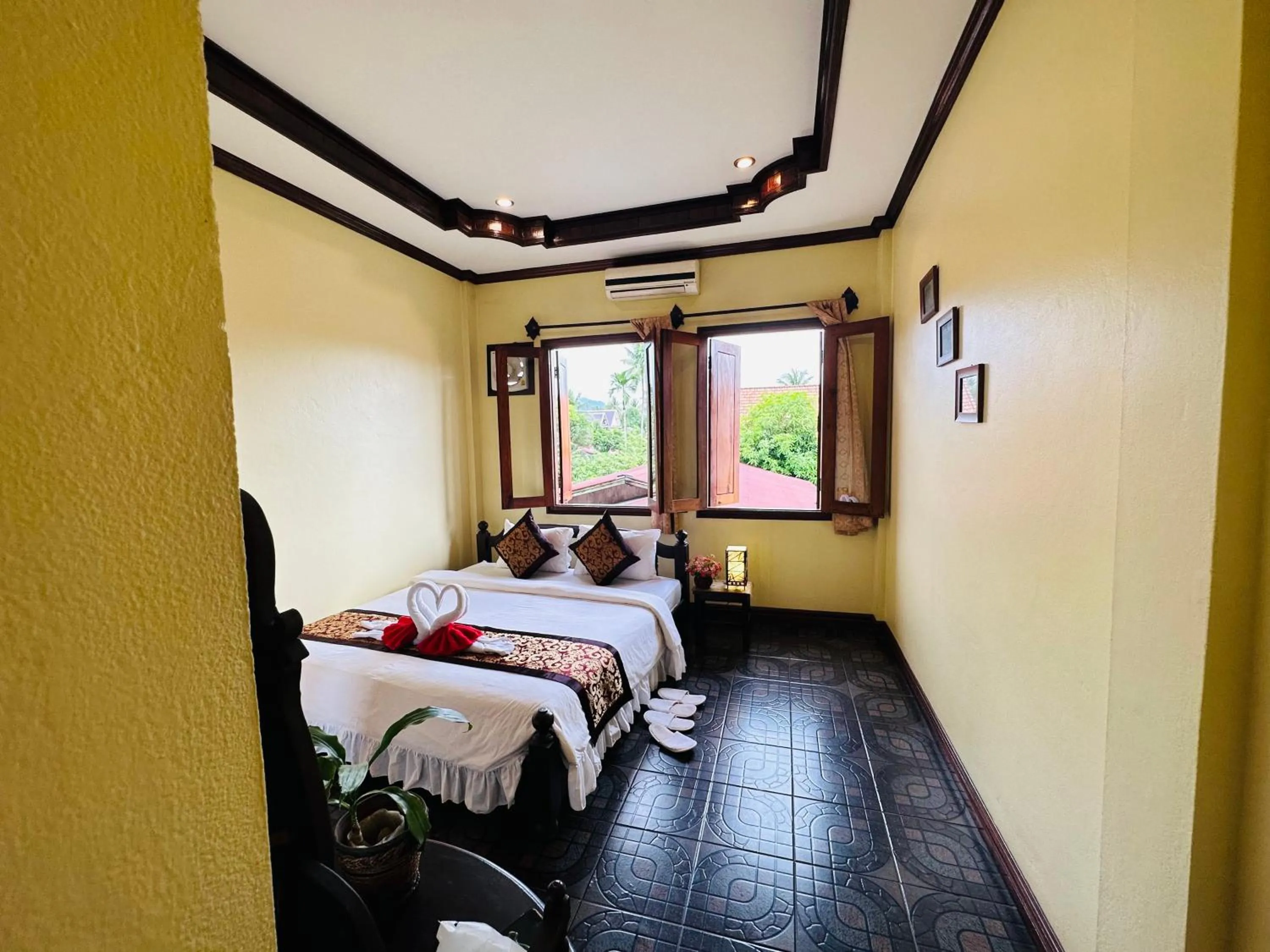 Bed in Visoun Luang Prabang Hotel