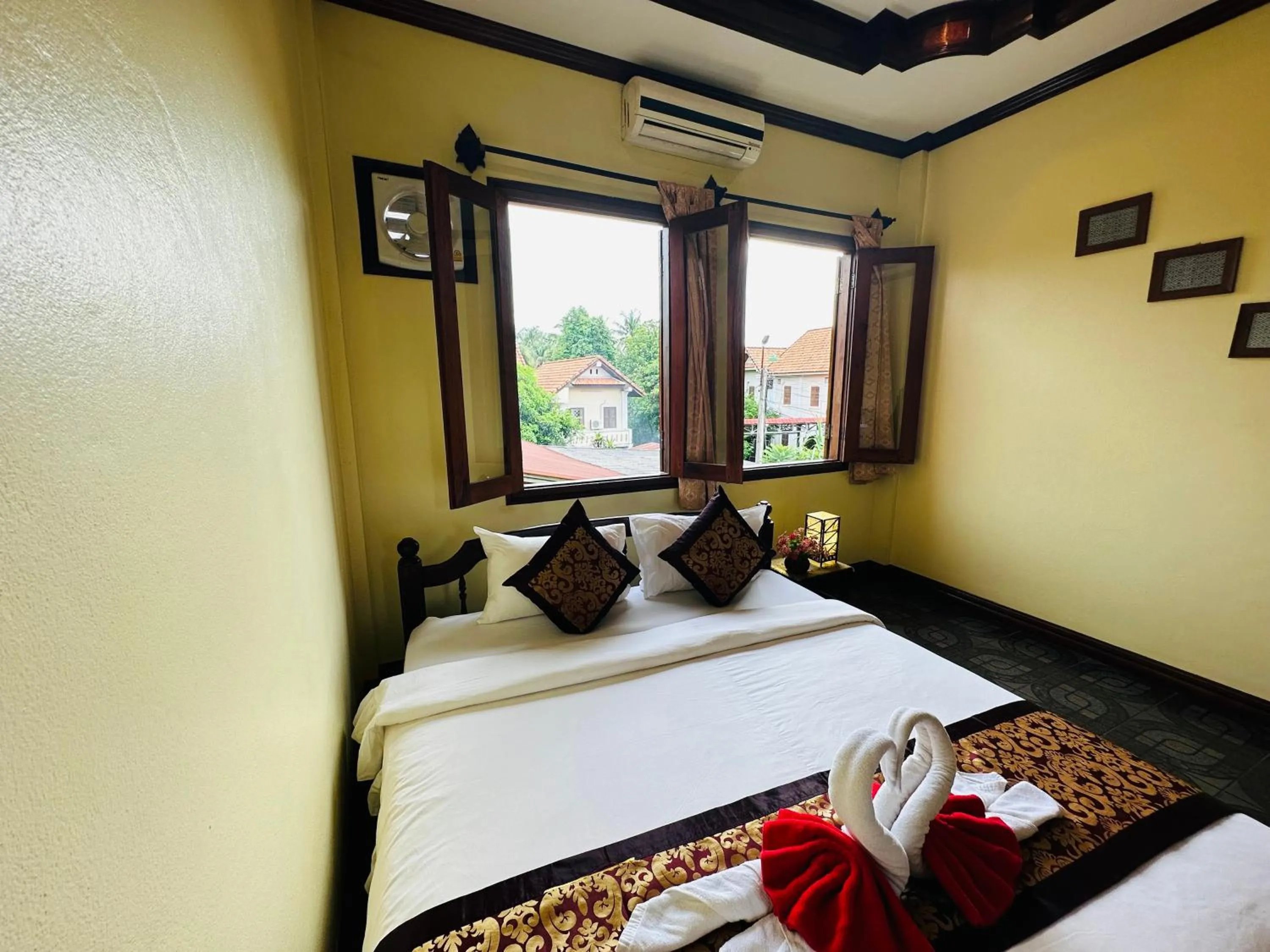 Bed in Visoun Luang Prabang Hotel