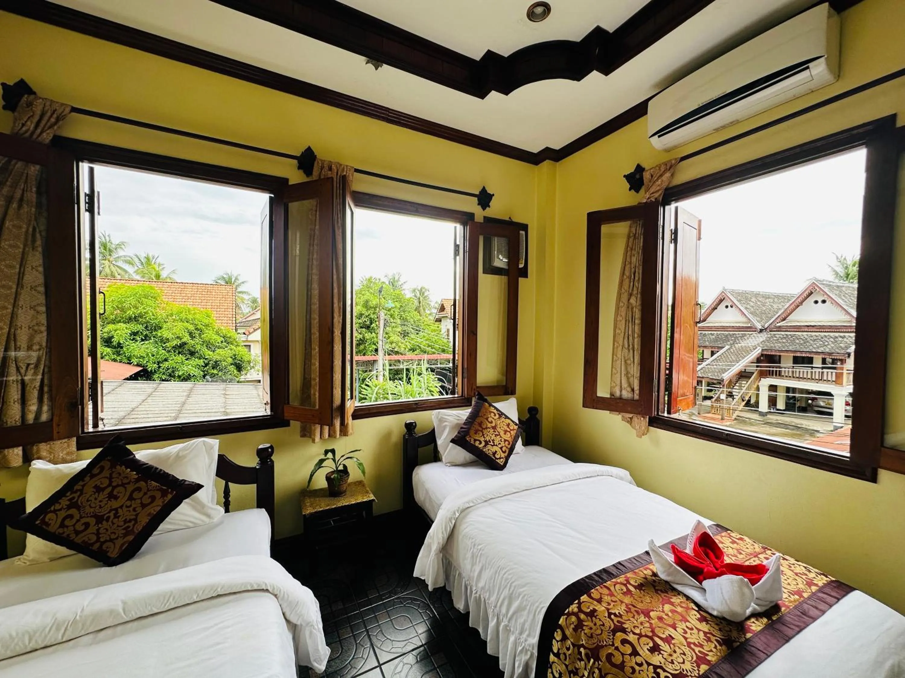 Bed in Visoun Luang Prabang Hotel