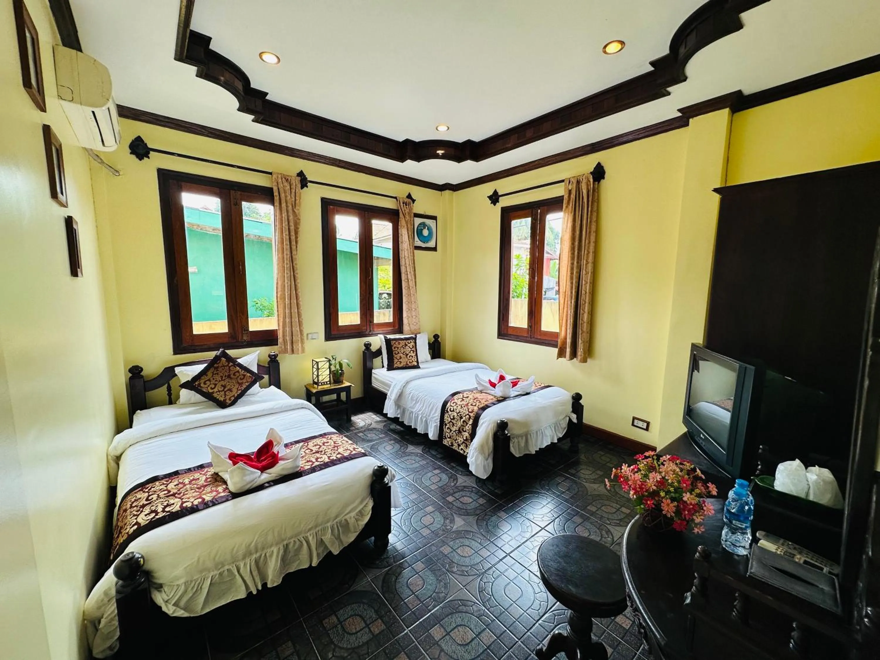 Communal lounge/ TV room, Bed in Visoun Luang Prabang Hotel