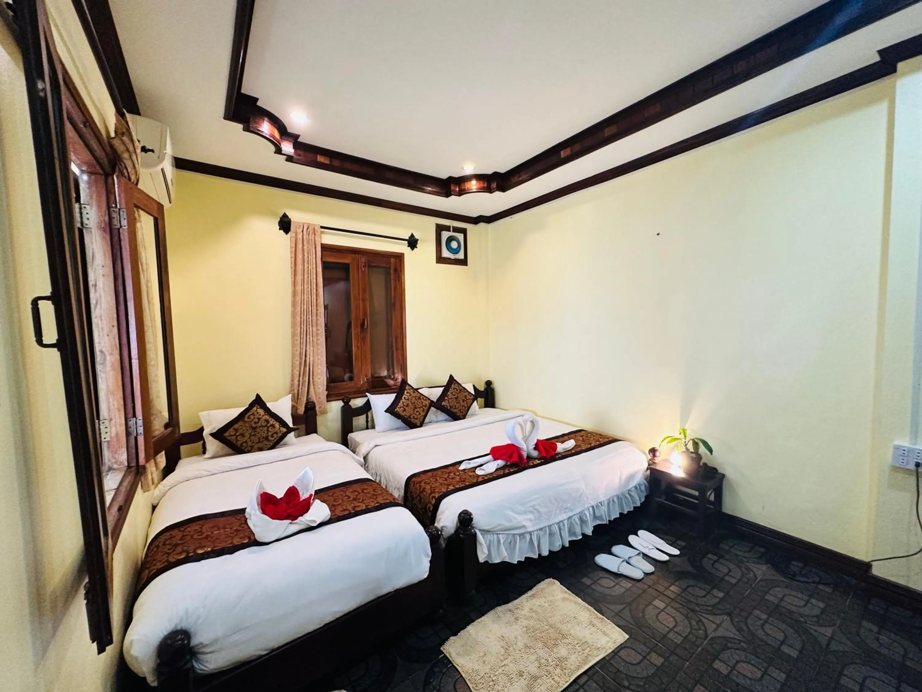 Bed in Visoun Luang Prabang Hotel