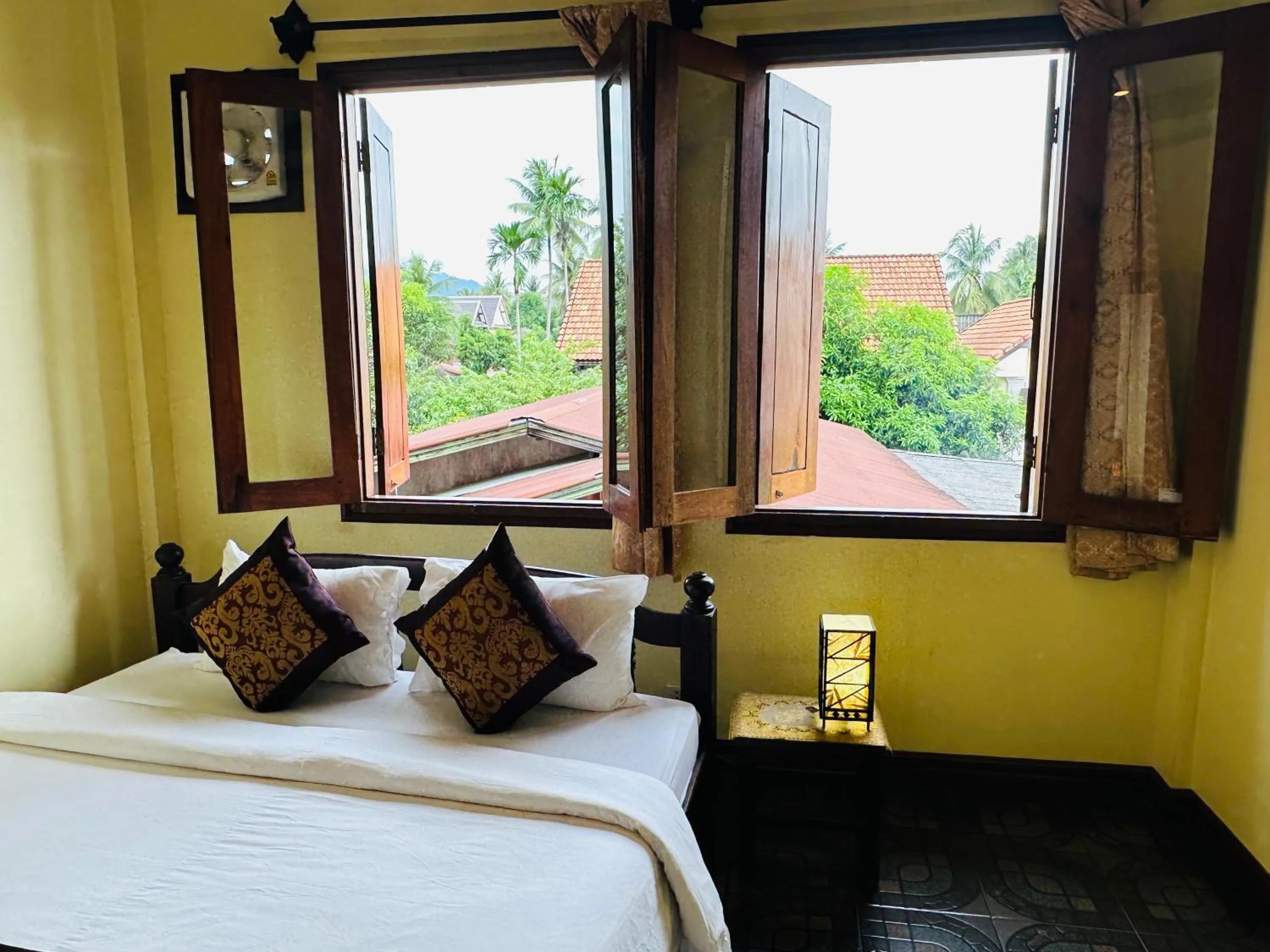 Bed in Visoun Luang Prabang Hotel