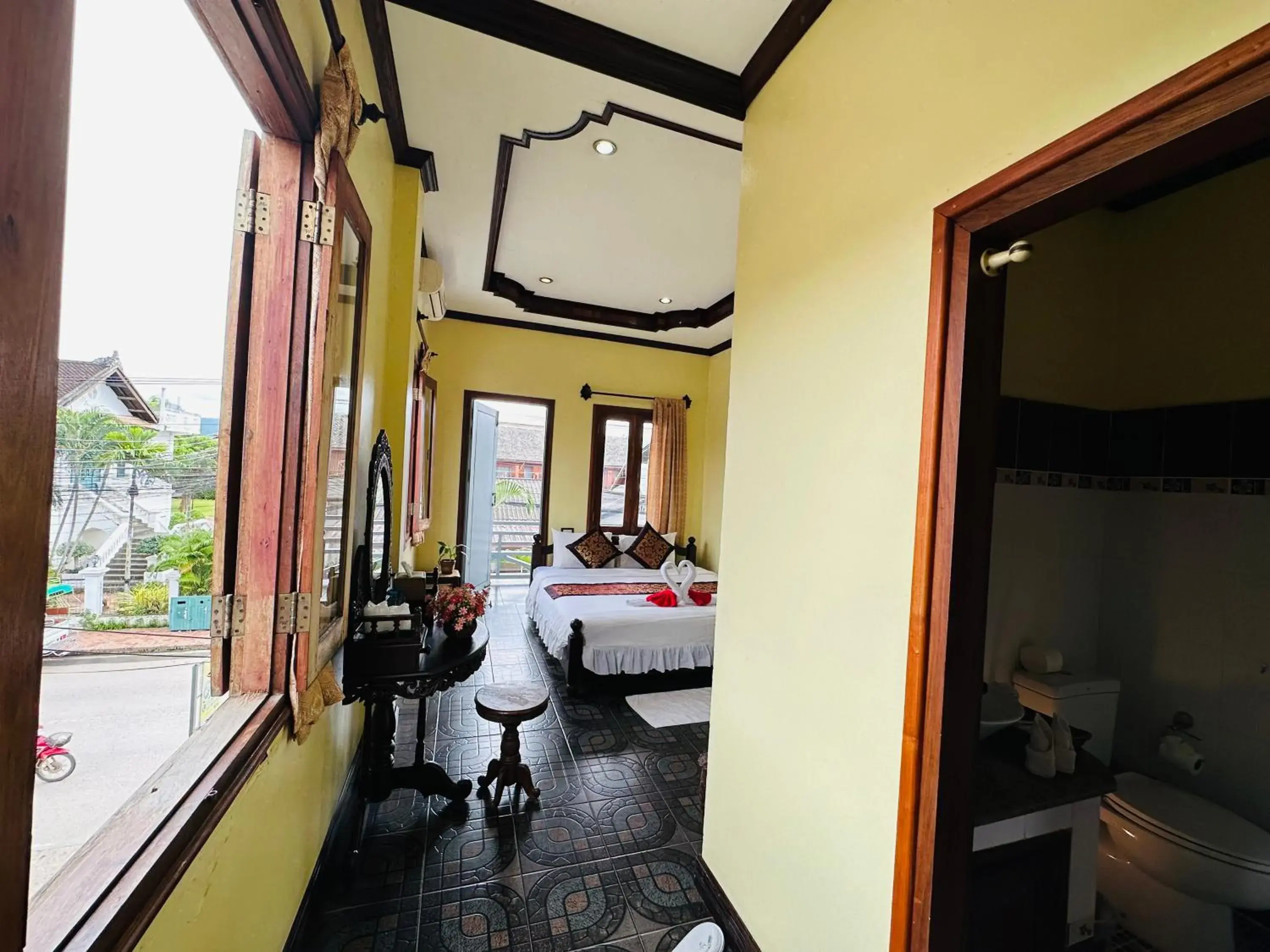 Deluxe Double Room with Balcony in Visoun Luang Prabang Hotel Deluxe Double Room with Balcony in Visoun Luang Prabang Hotel