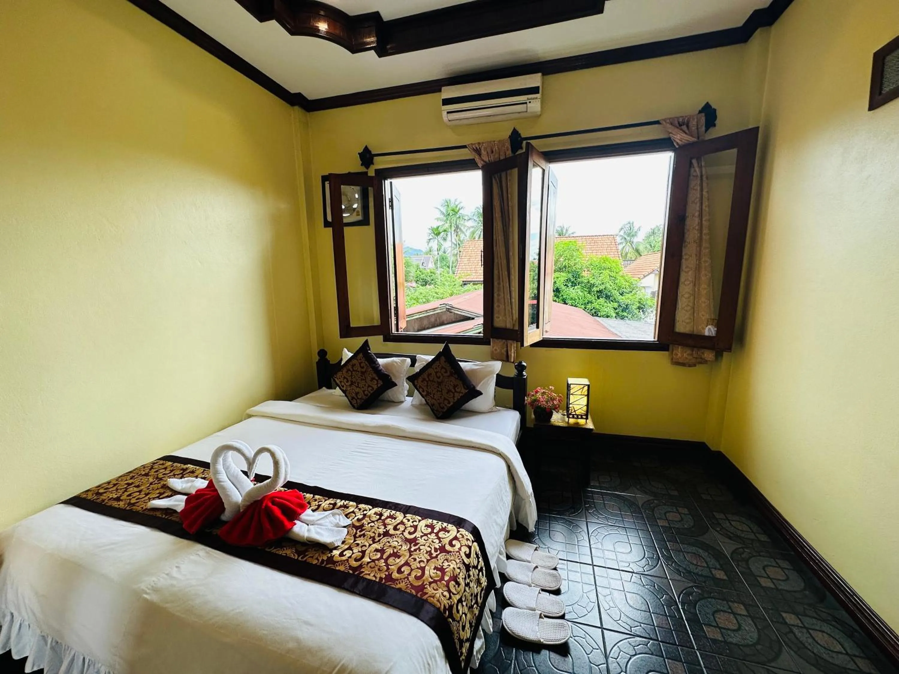 Bed in Visoun Luang Prabang Hotel