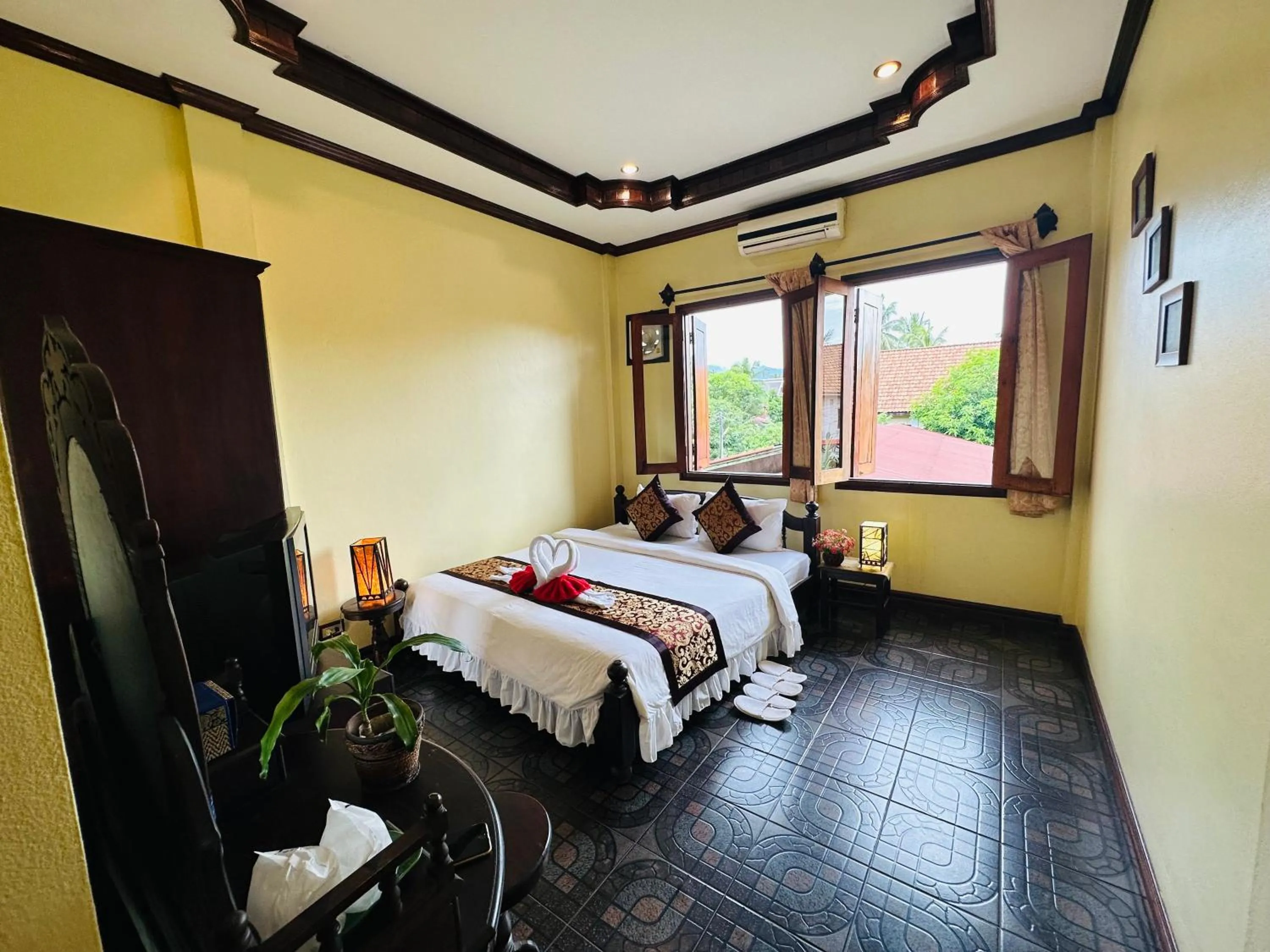 Bed in Visoun Luang Prabang Hotel