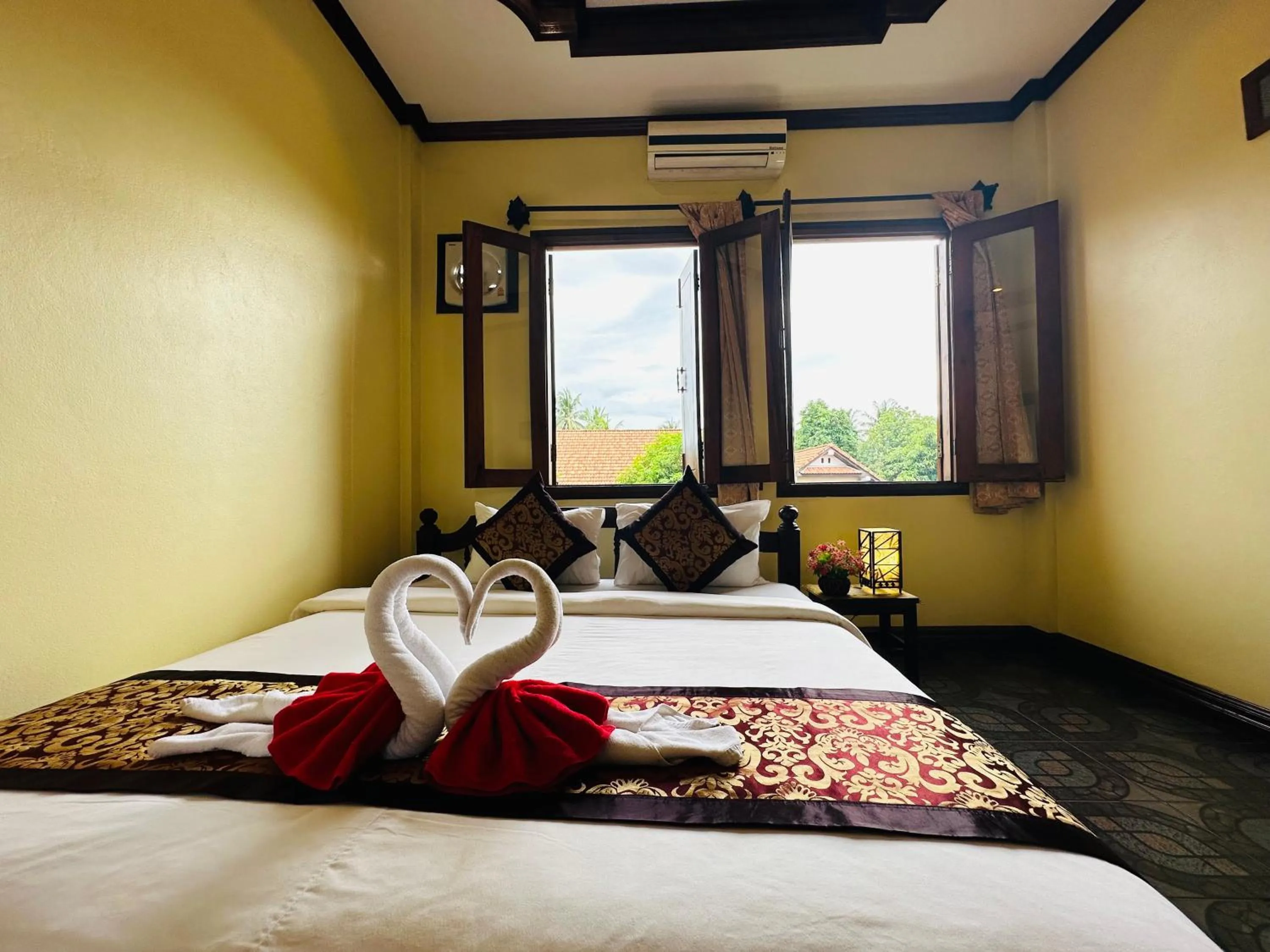 Bed in Visoun Luang Prabang Hotel