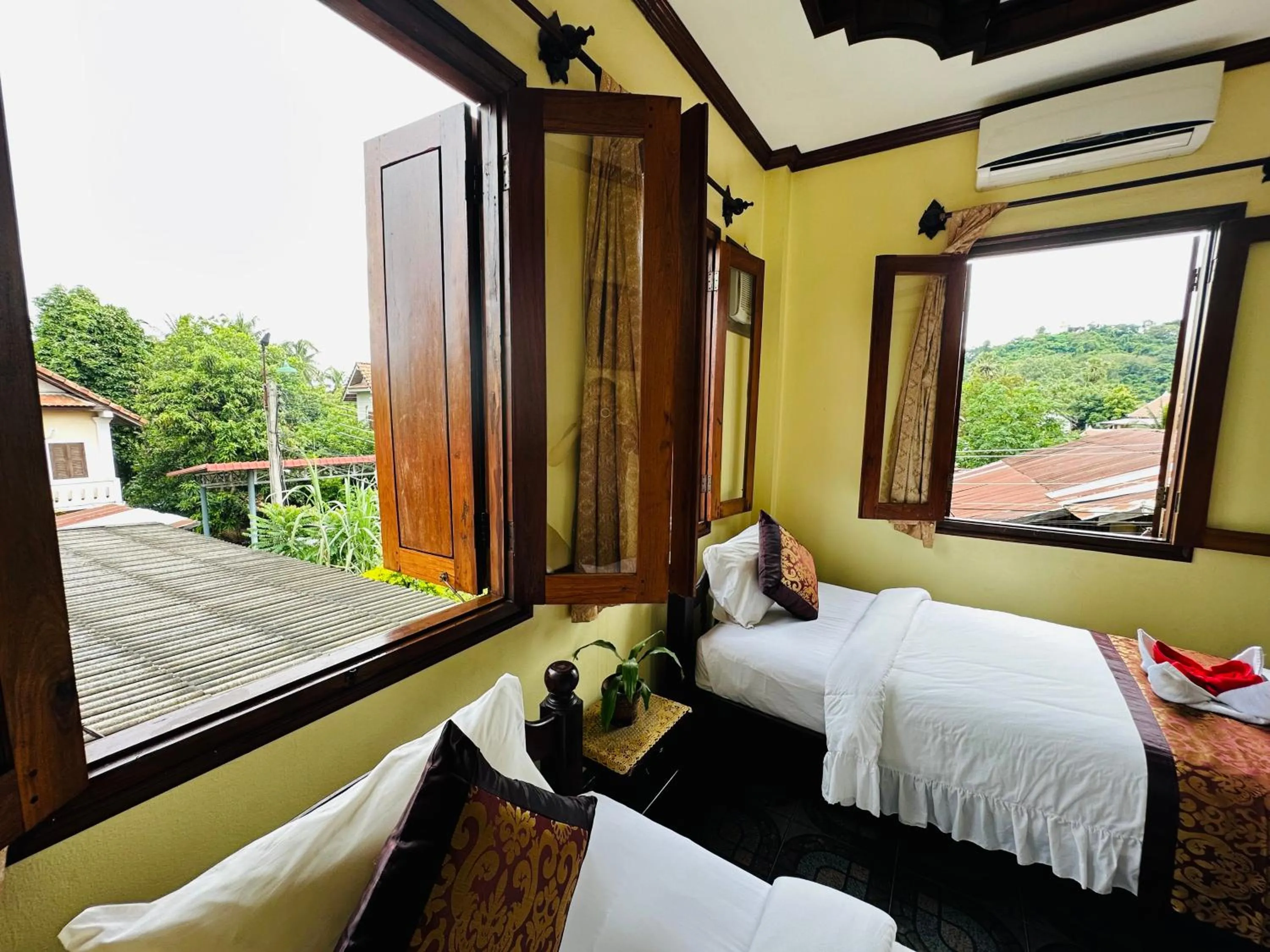 Bed in Visoun Luang Prabang Hotel
