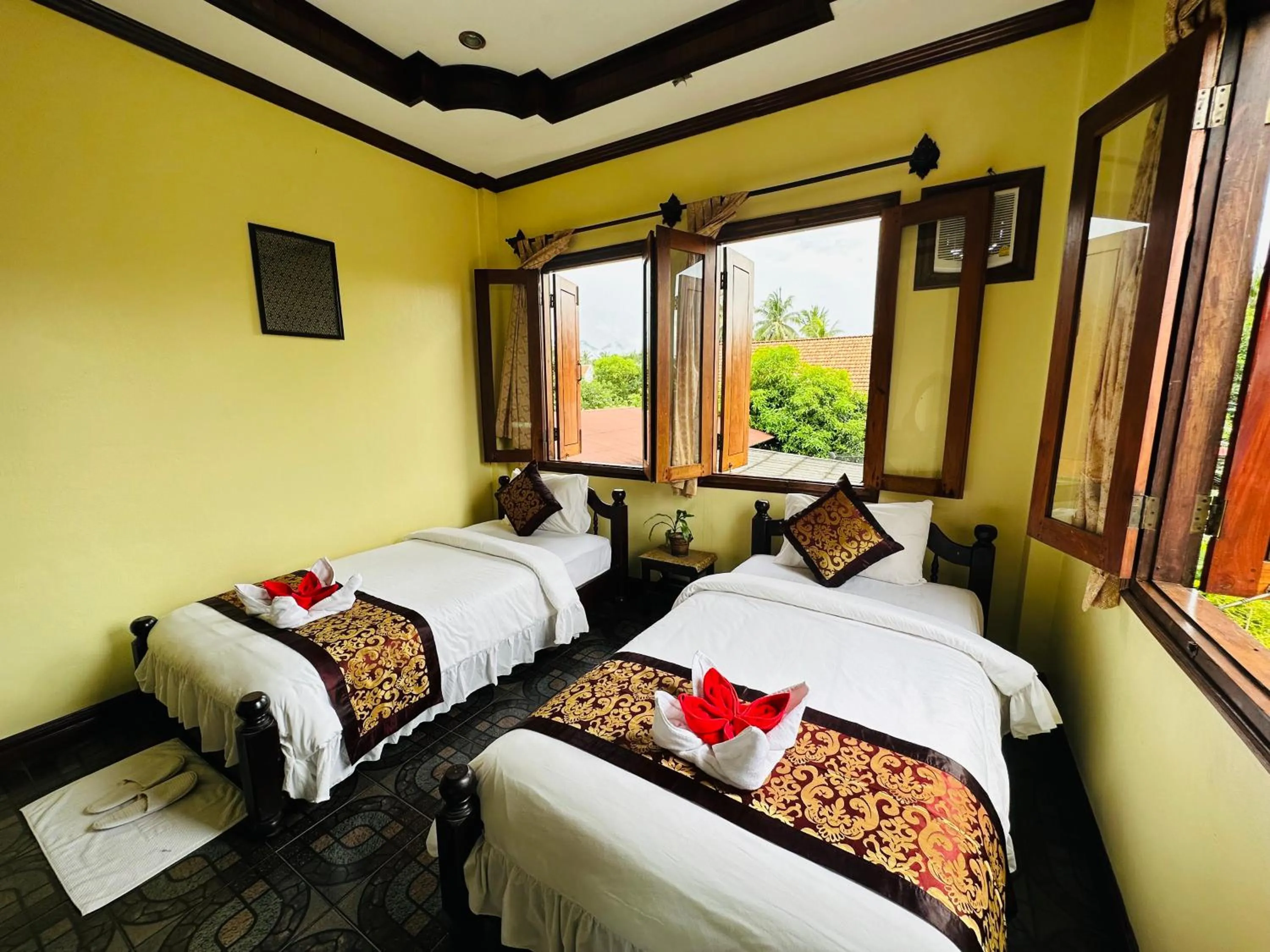 Bed in Visoun Luang Prabang Hotel