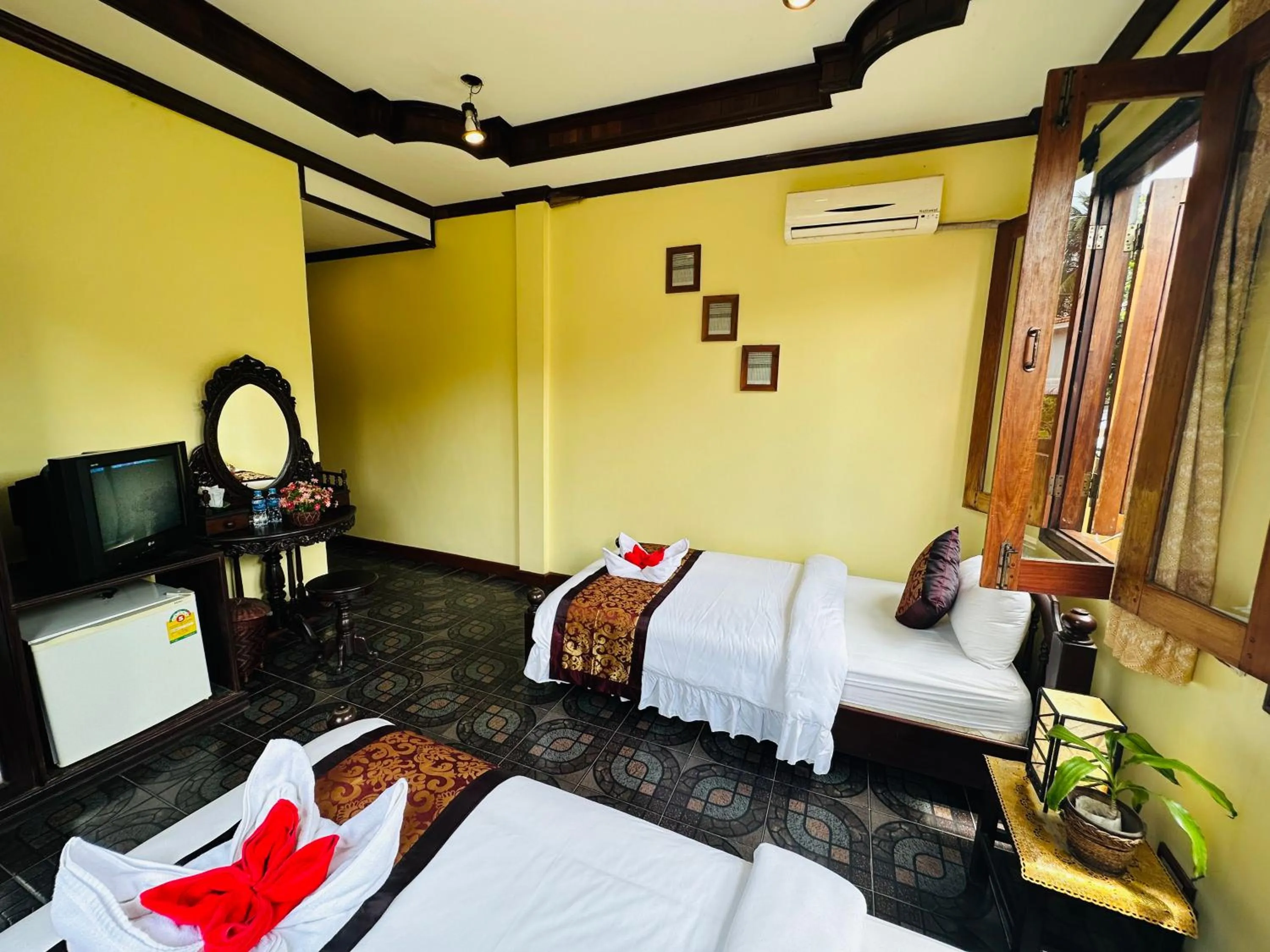 Bed in Visoun Luang Prabang Hotel