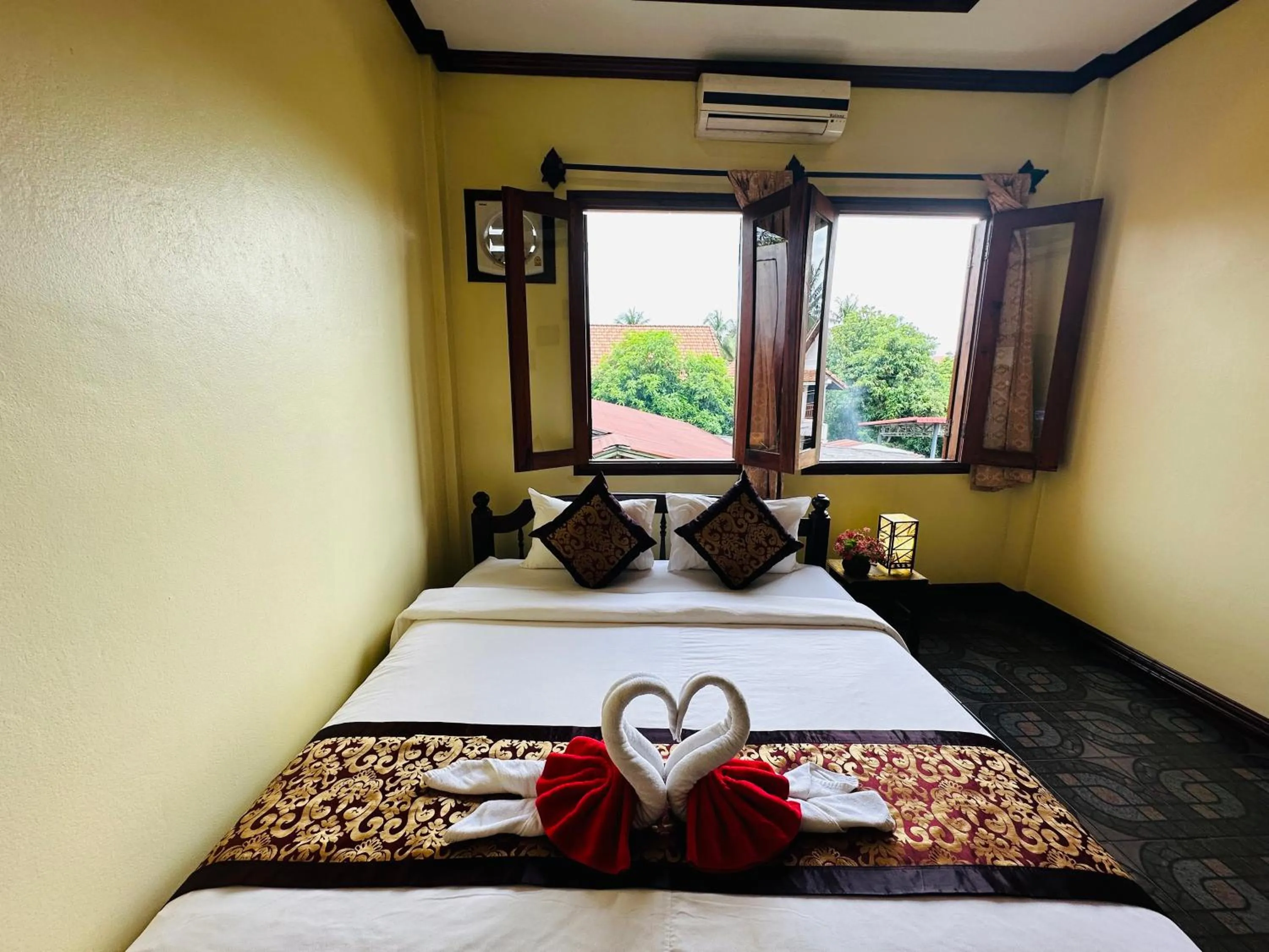 Bed in Visoun Luang Prabang Hotel