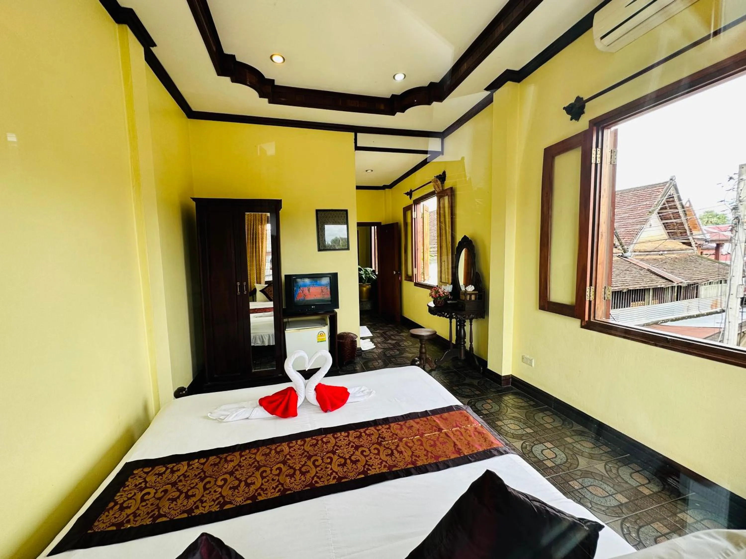 Bed in Visoun Luang Prabang Hotel