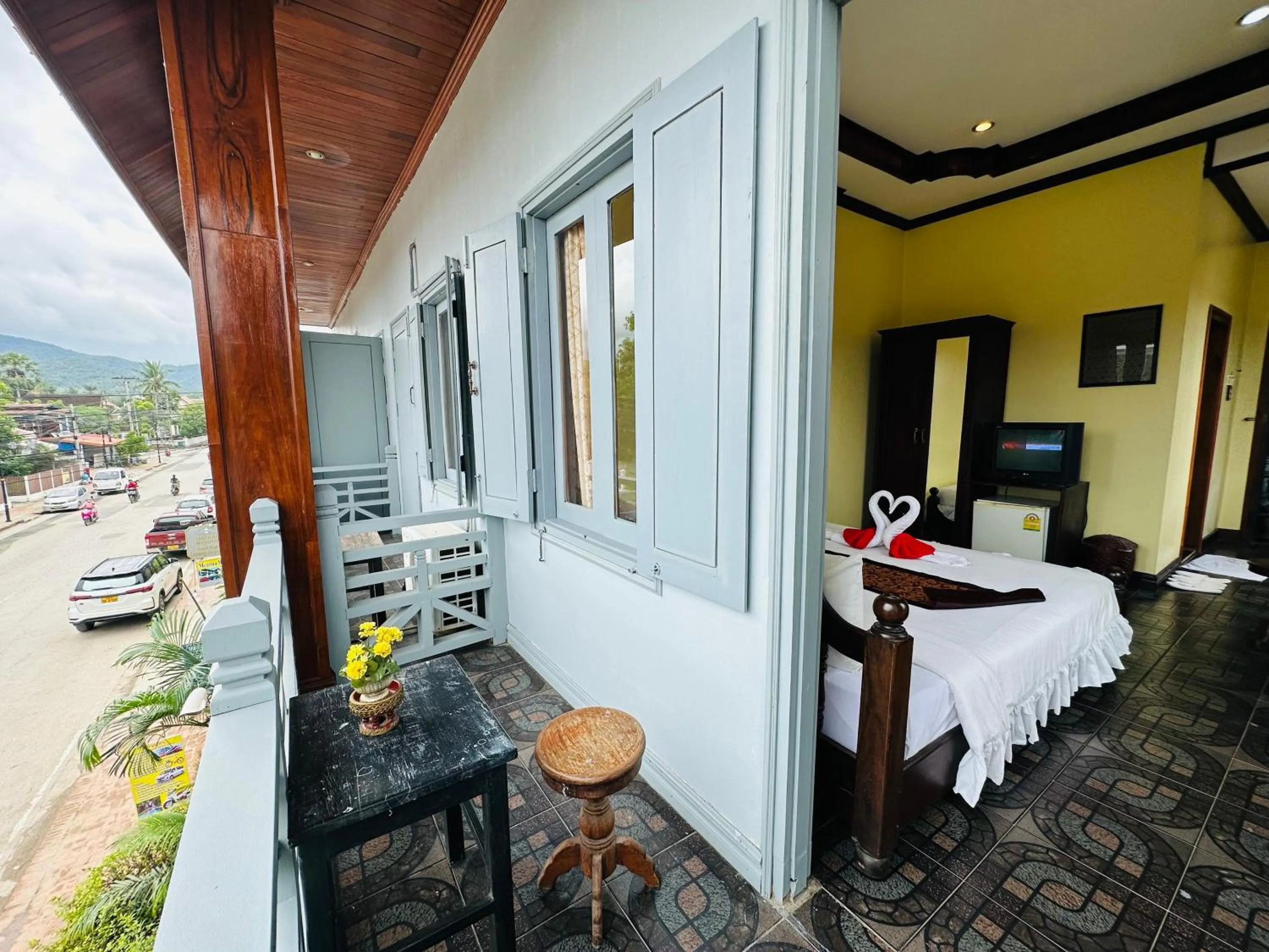 Communal lounge/ TV room, Bed in Visoun Luang Prabang Hotel