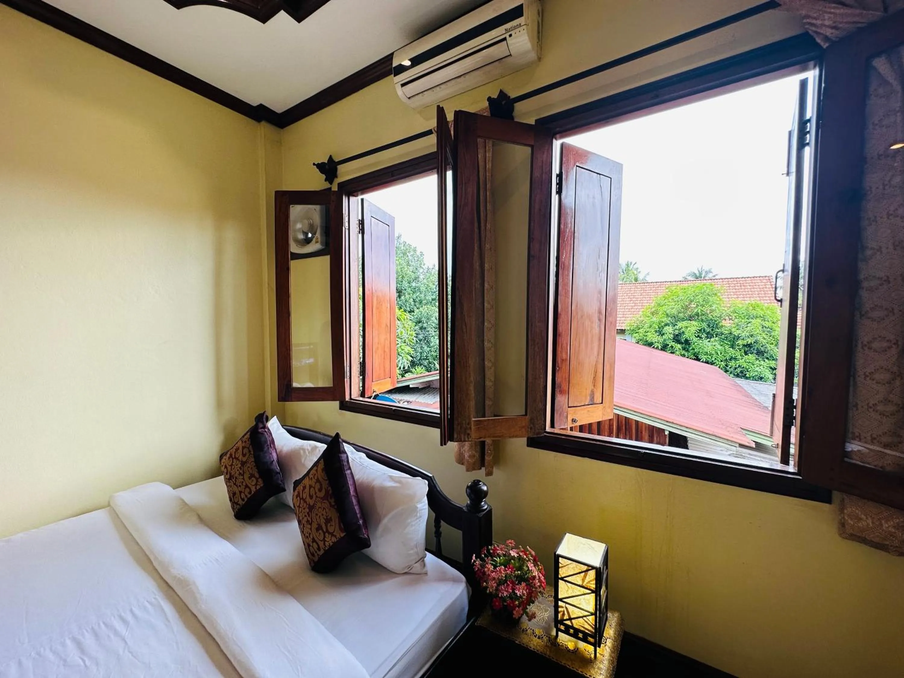 Bed in Visoun Luang Prabang Hotel