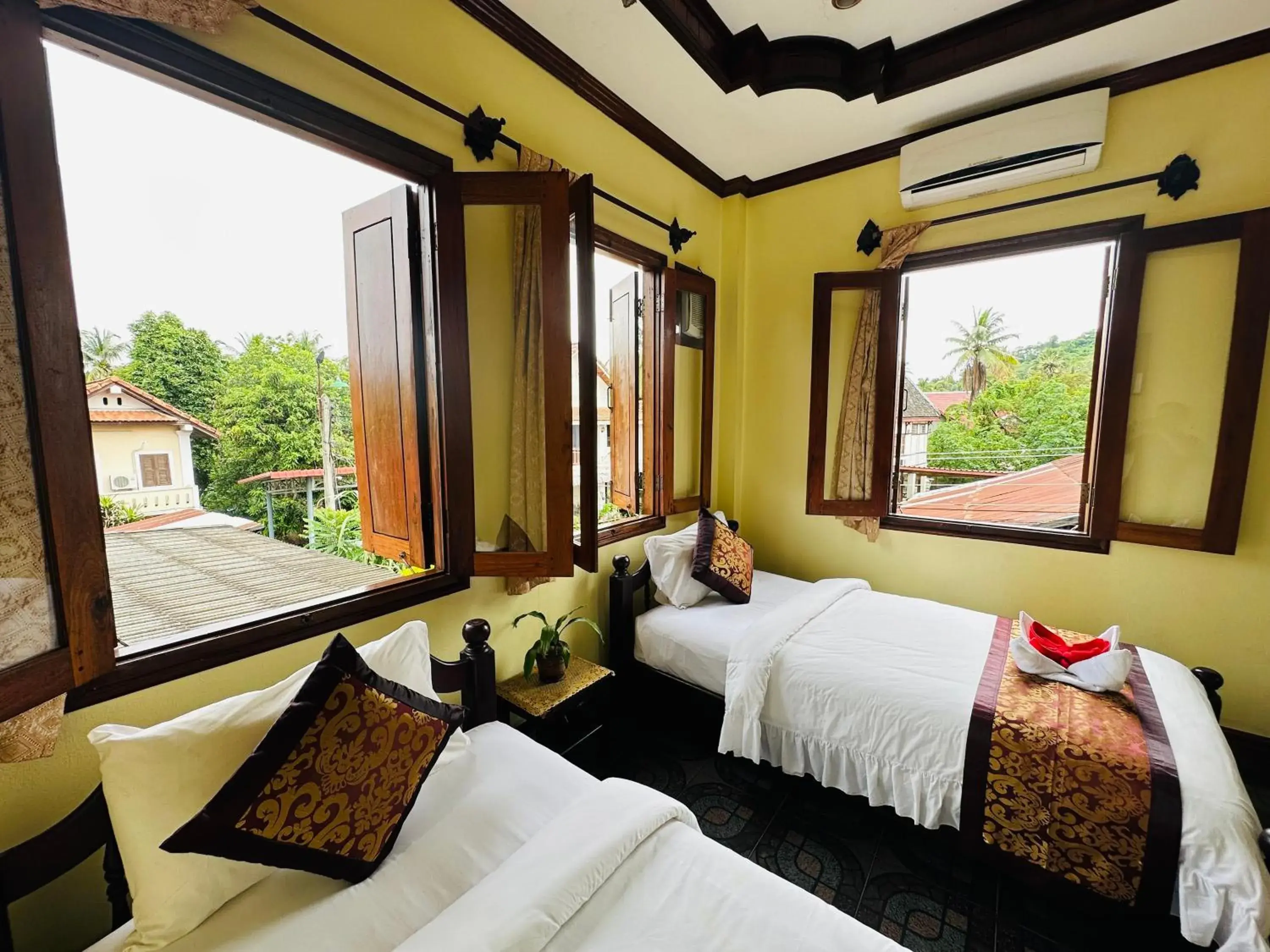 Bed in Visoun Luang Prabang Hotel Bed in Visoun Luang Prabang Hotel