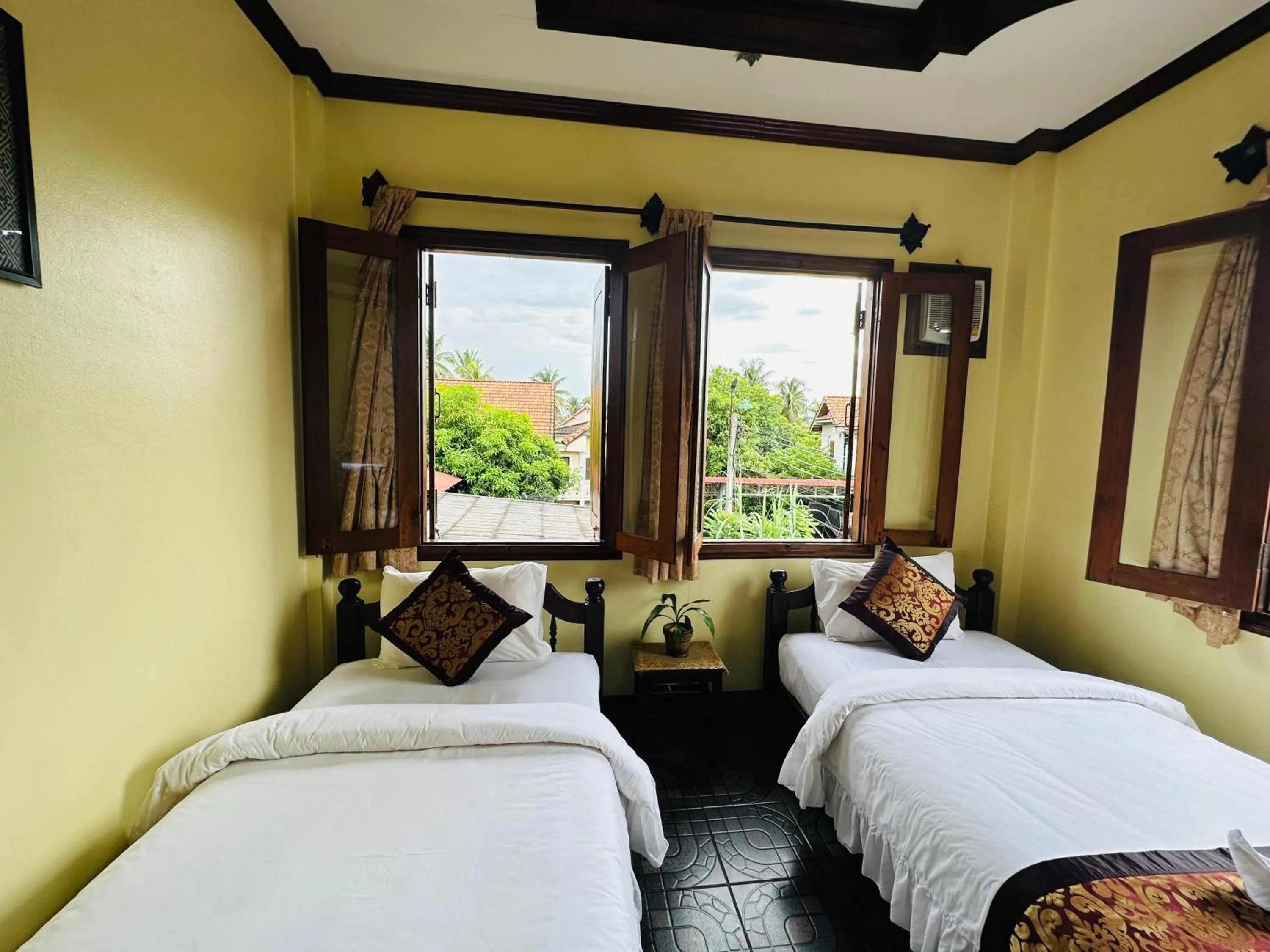 Bed in Visoun Luang Prabang Hotel