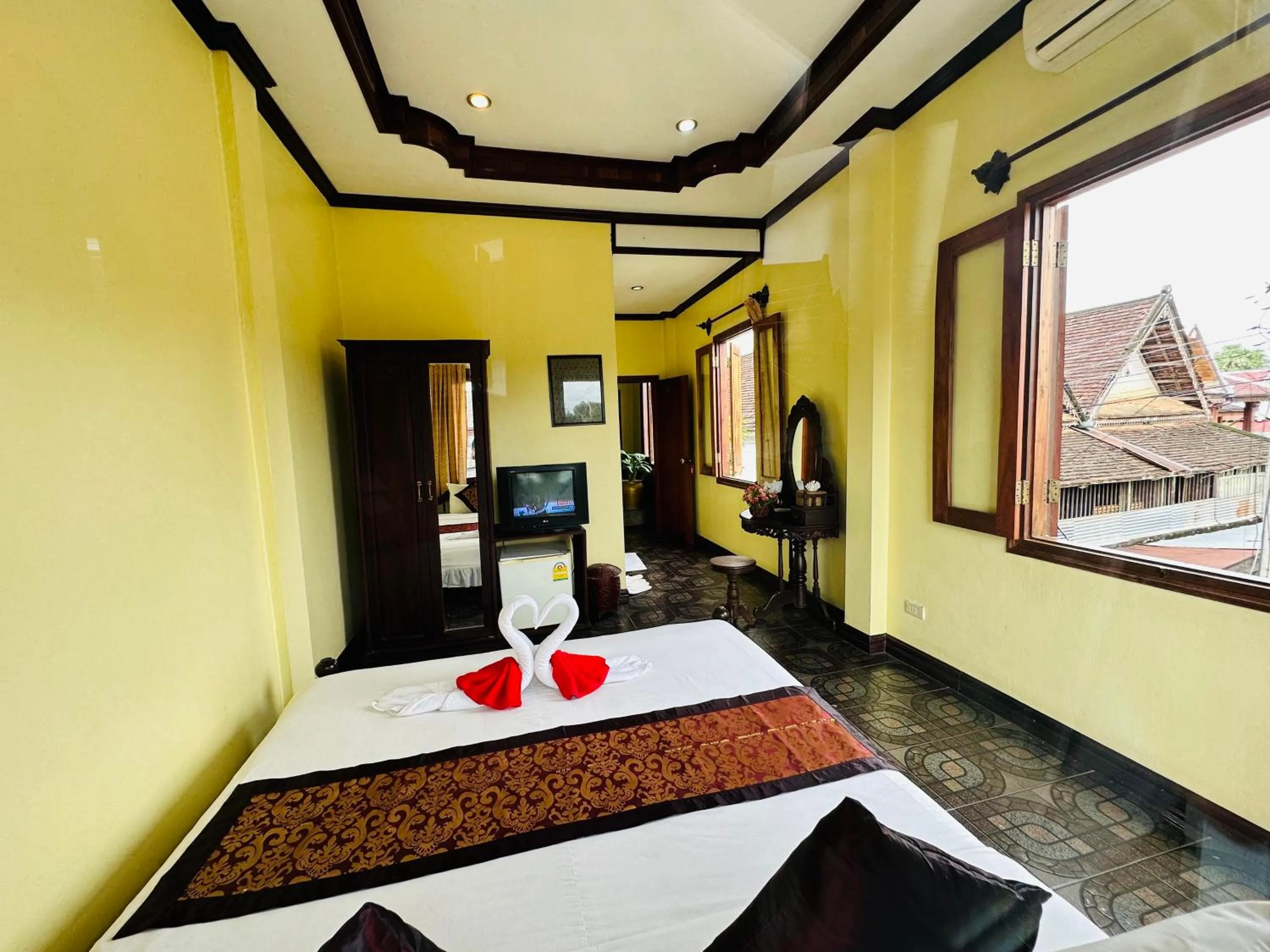 Bed in Visoun Luang Prabang Hotel