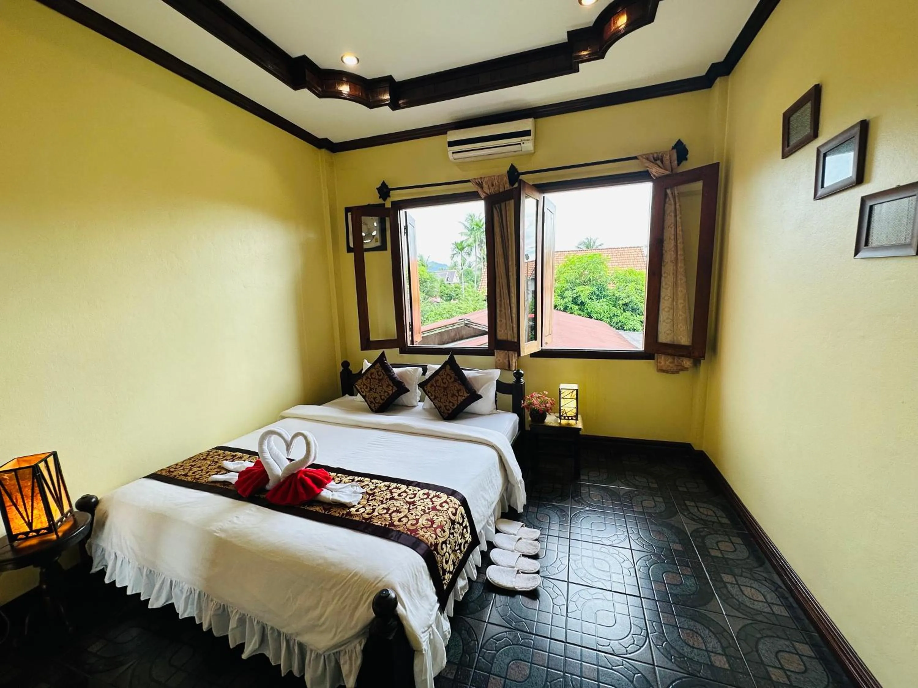 Bed in Visoun Luang Prabang Hotel