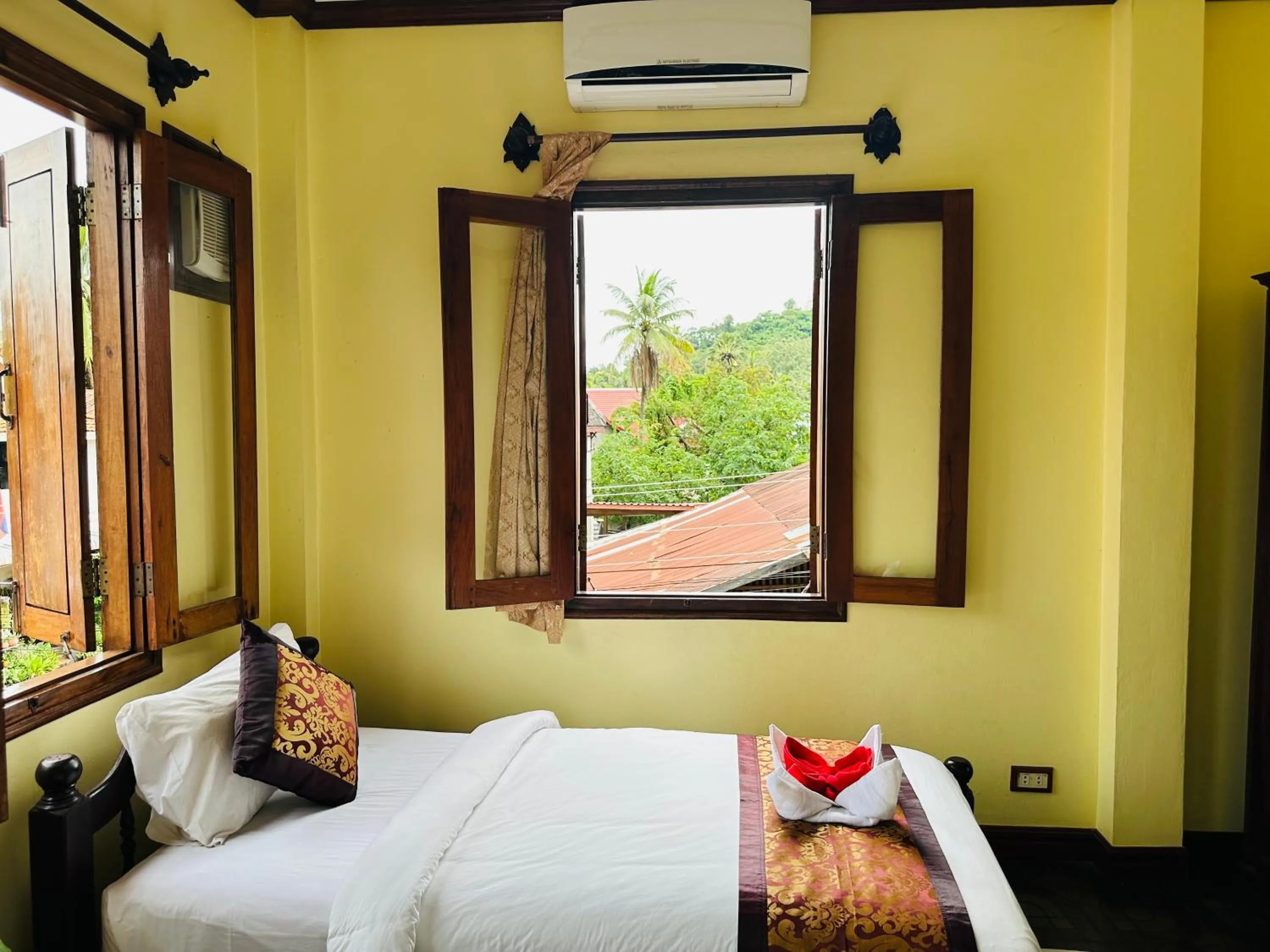 Bed in Visoun Luang Prabang Hotel