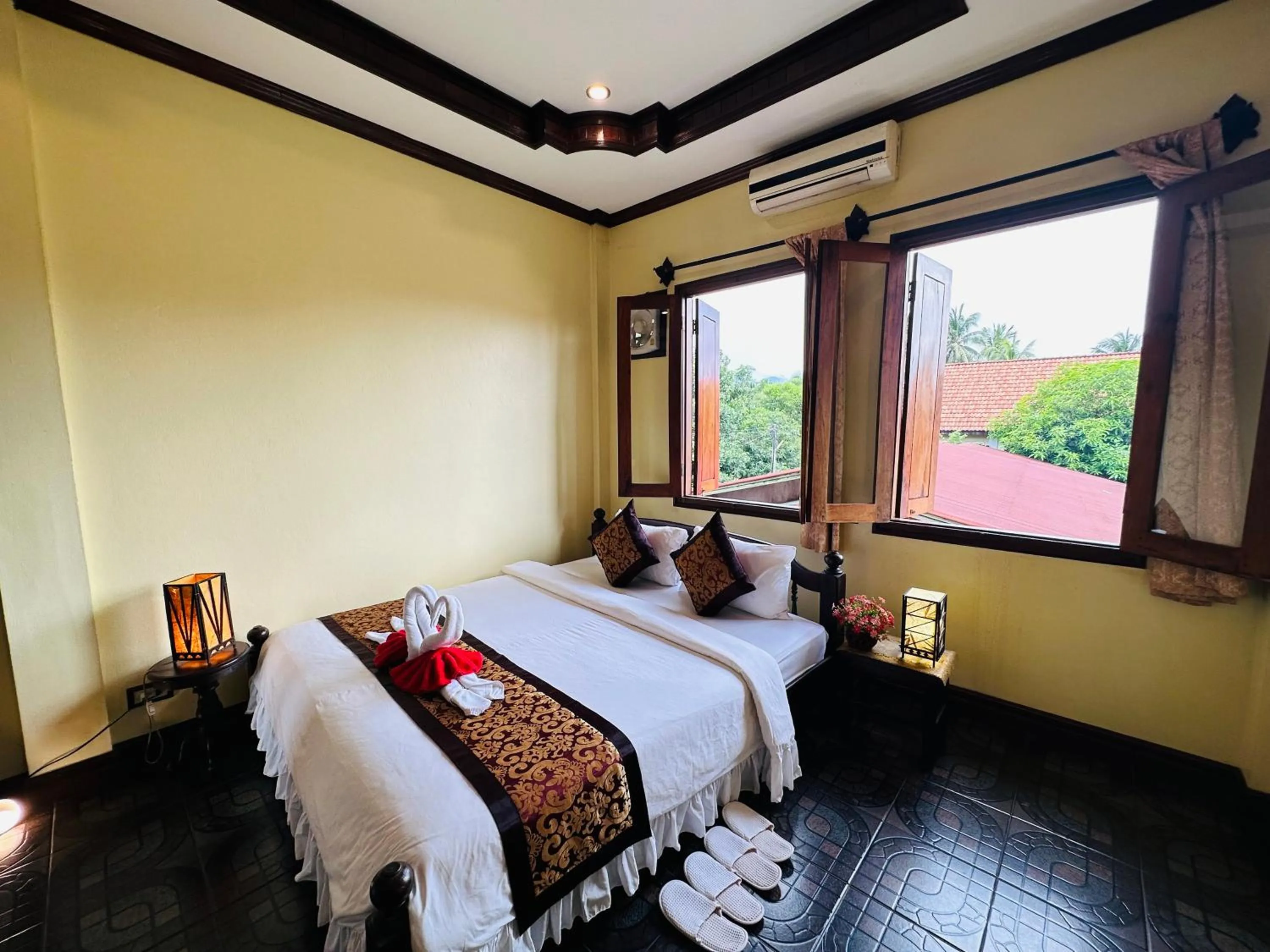 Bed in Visoun Luang Prabang Hotel