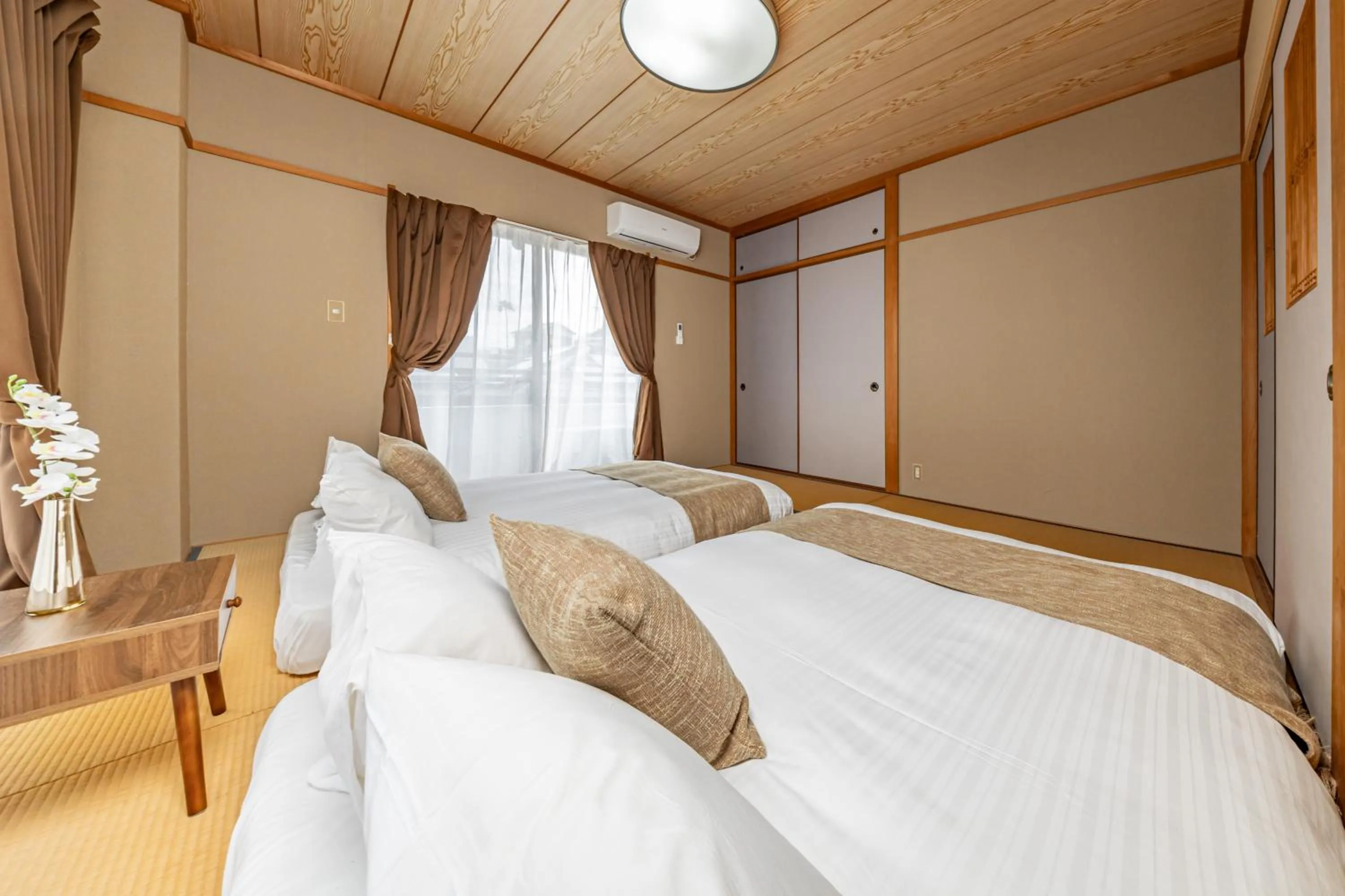 Bed in Azami Ann Maisonette