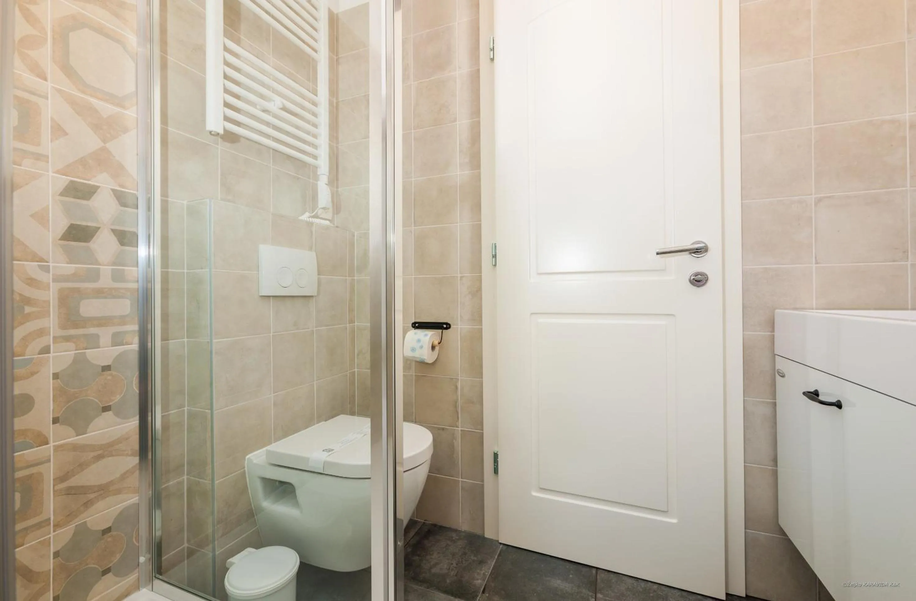 Toilet in Aldo Apartments Center