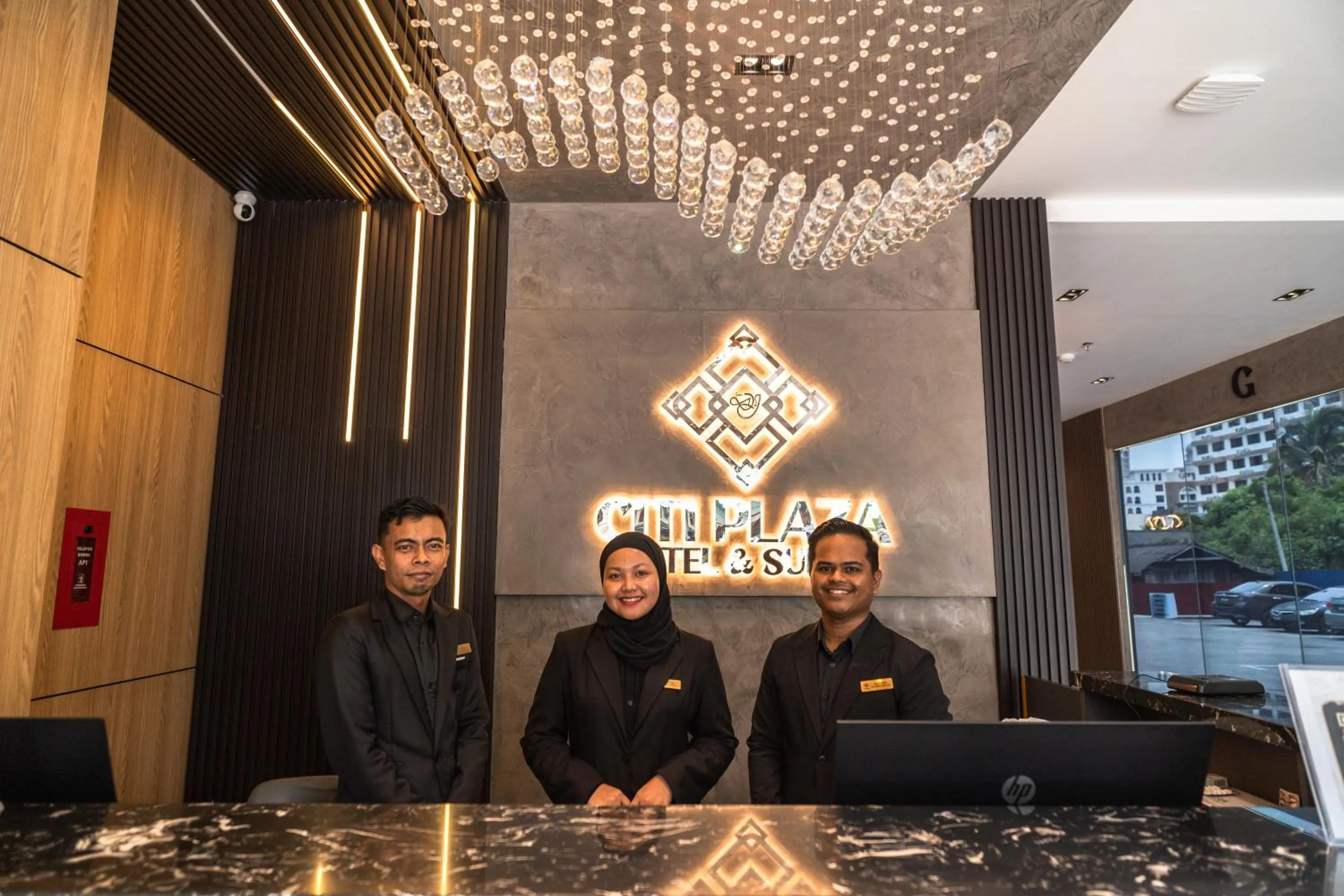 Staff in DJ Citi Plaza Hotel & Suites