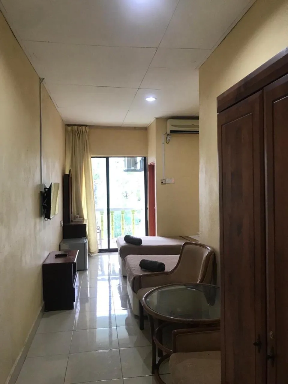 Communal lounge/ TV room in ANZ LANGKAWI INN