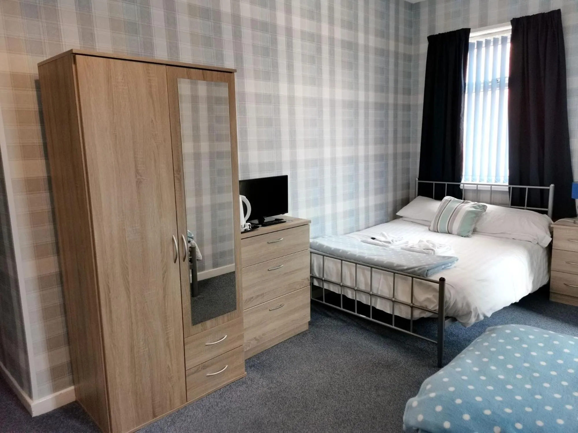 Bedroom in Sherwood Hotel