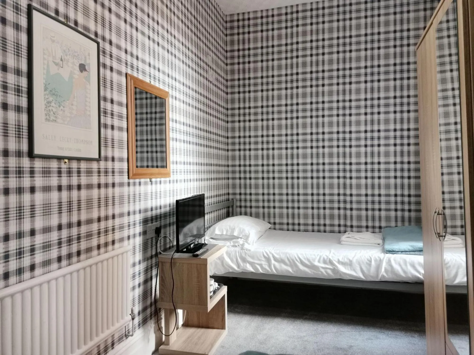 Bedroom in Sherwood Hotel