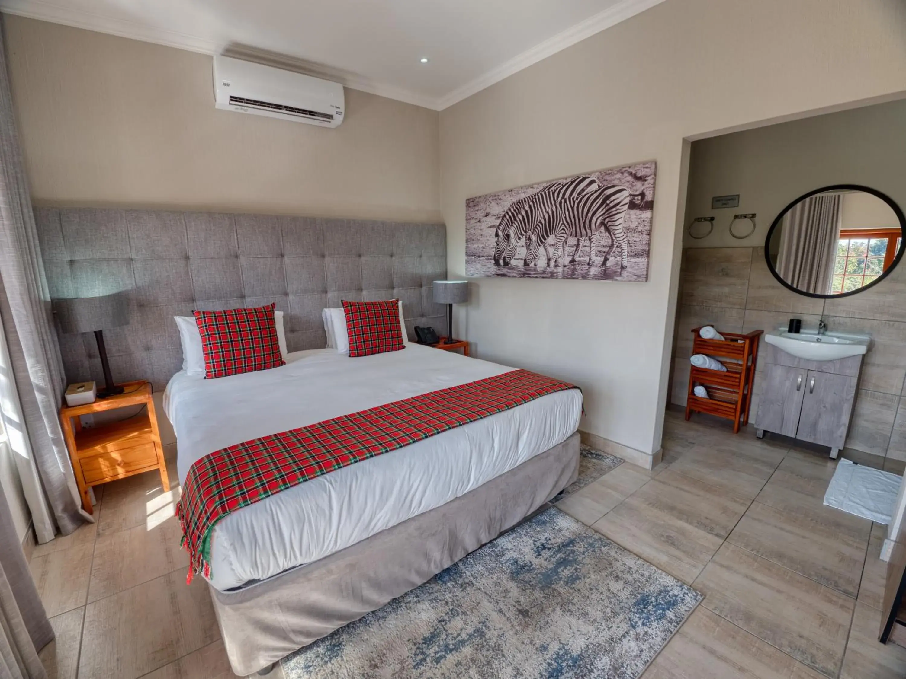 Bed in Tembo Guest Lodge Bed in Tembo Guest Lodge