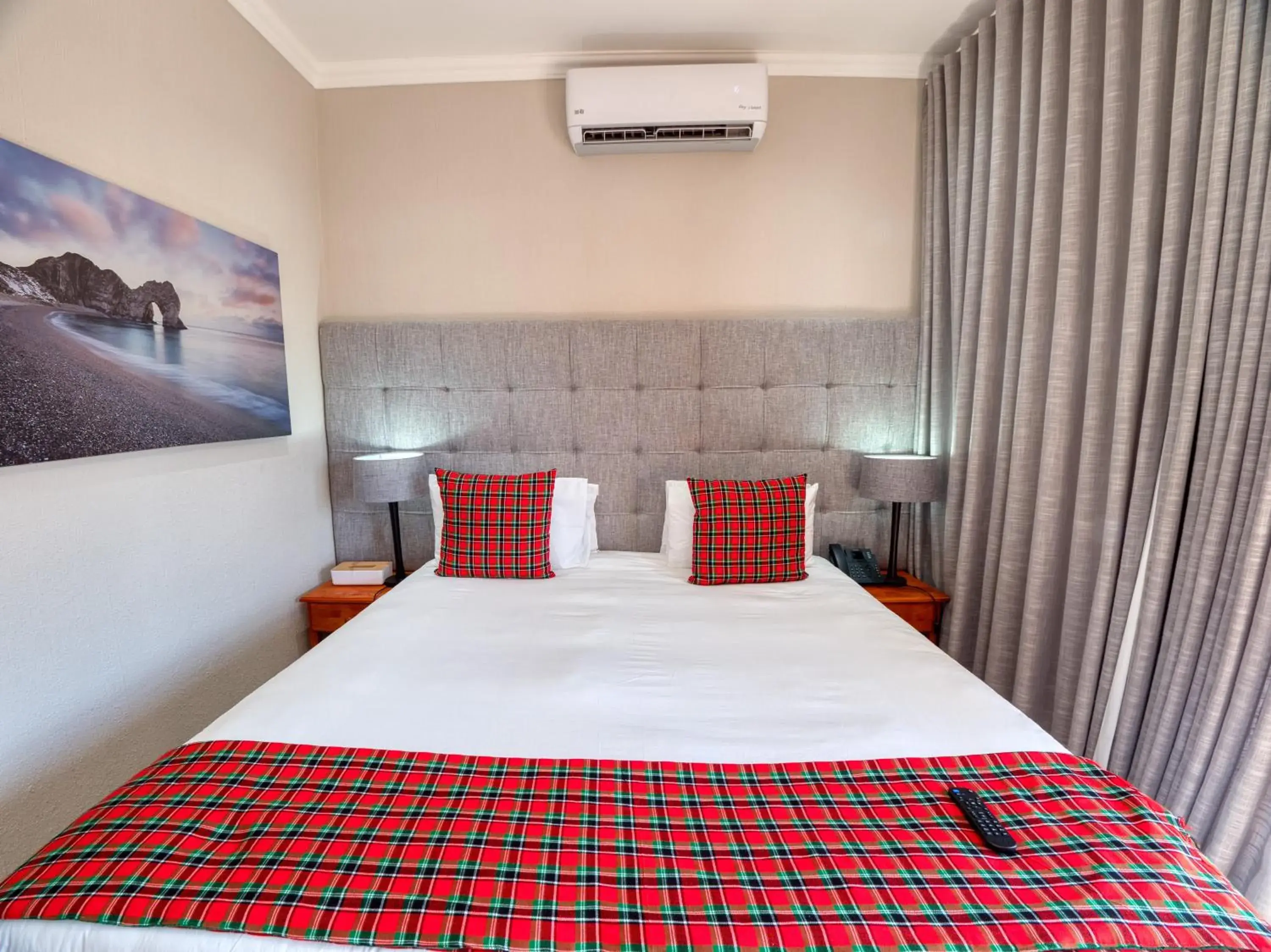 Bed in Tembo Guest Lodge Bed in Tembo Guest Lodge