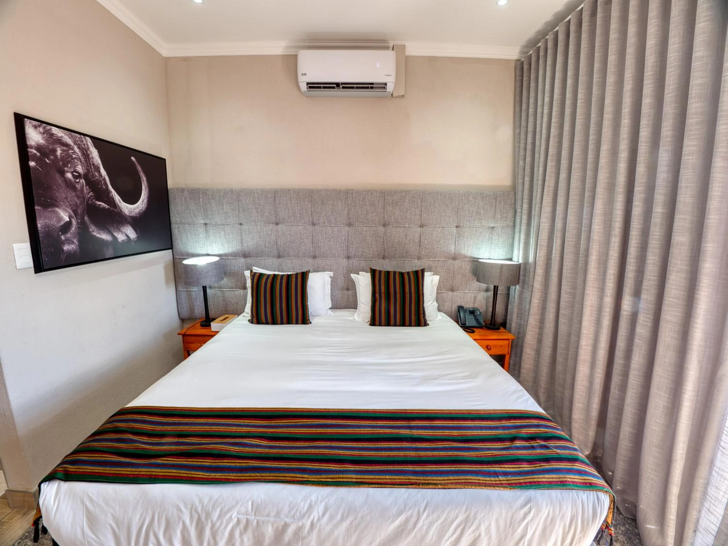 Bed in Tembo Guest Lodge