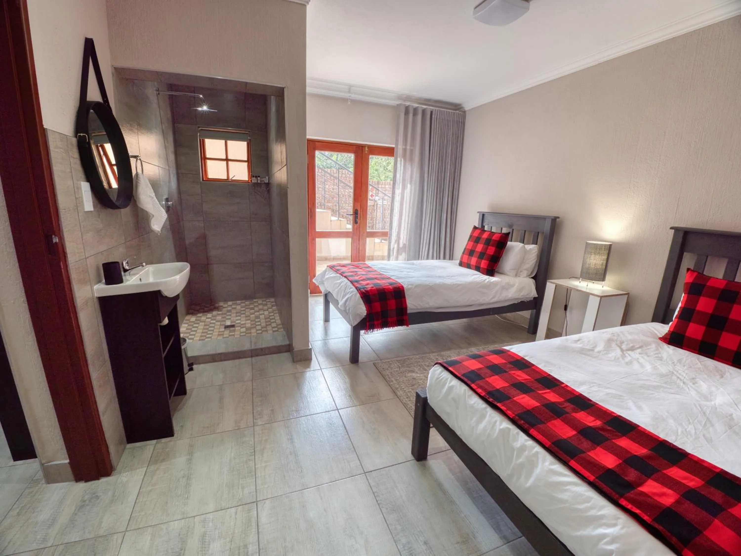 Bed in Tembo Guest Lodge