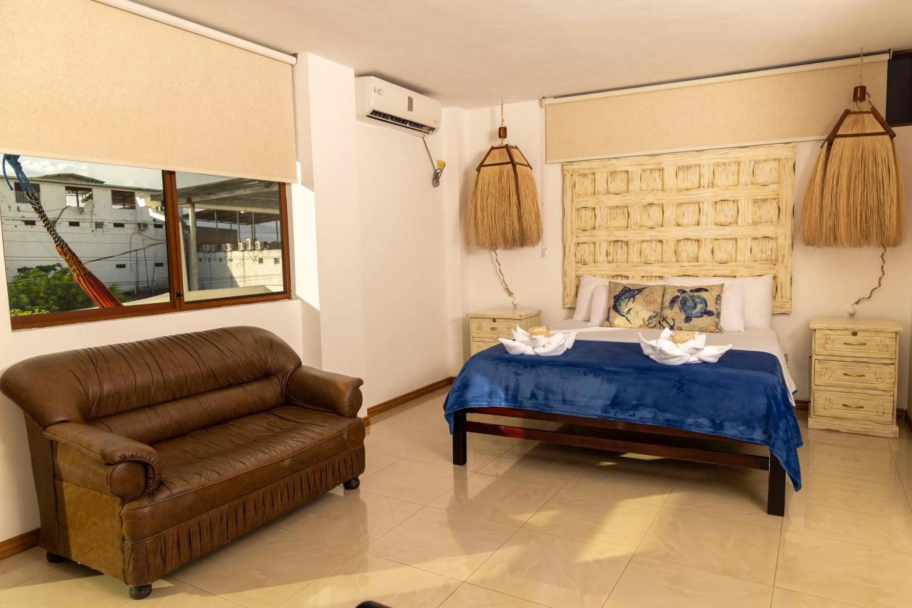 Photo of the whole room, Bed in Hotel Galapagos Planet