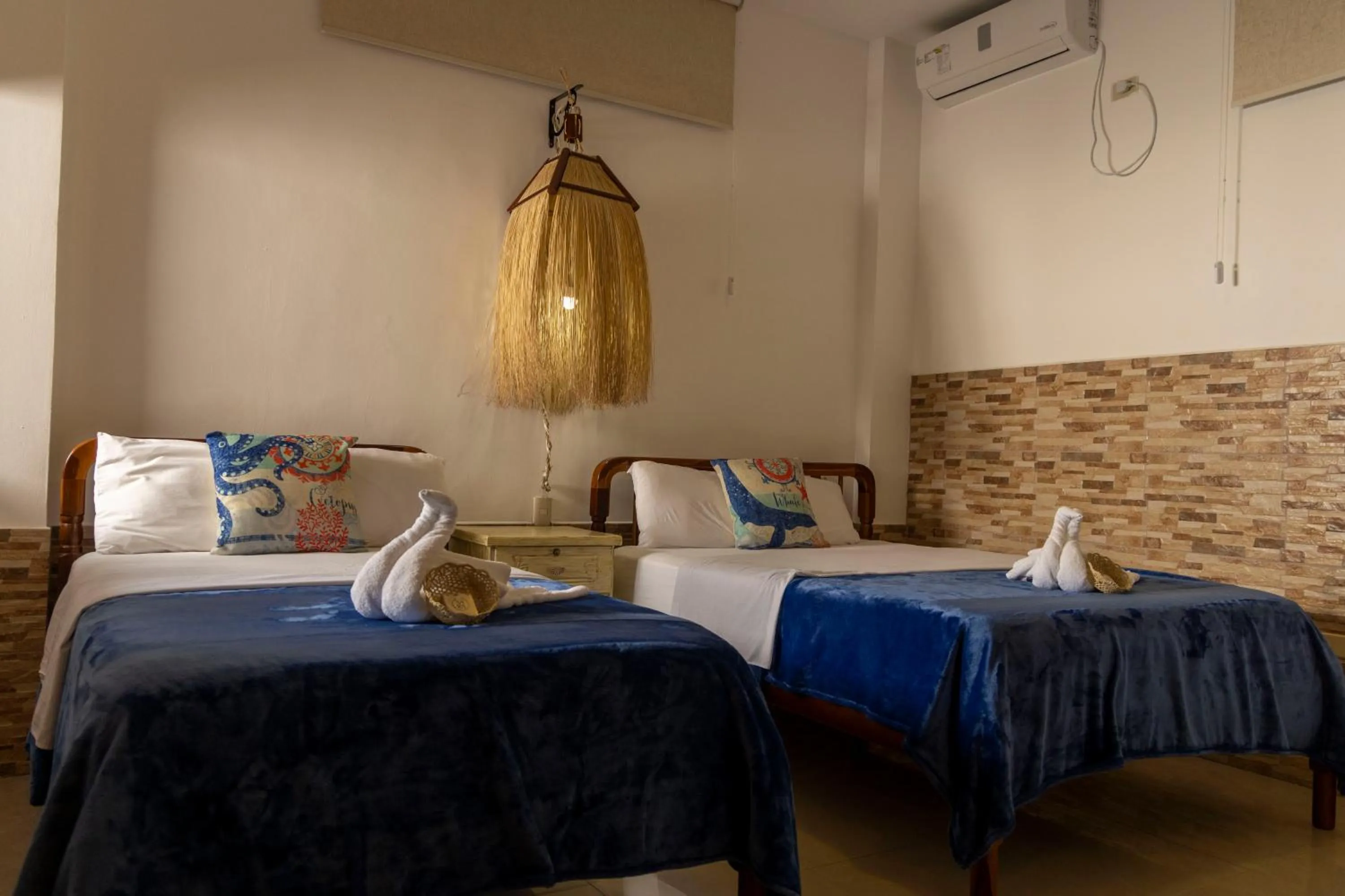 Photo of the whole room, Bed in Hotel Galapagos Planet