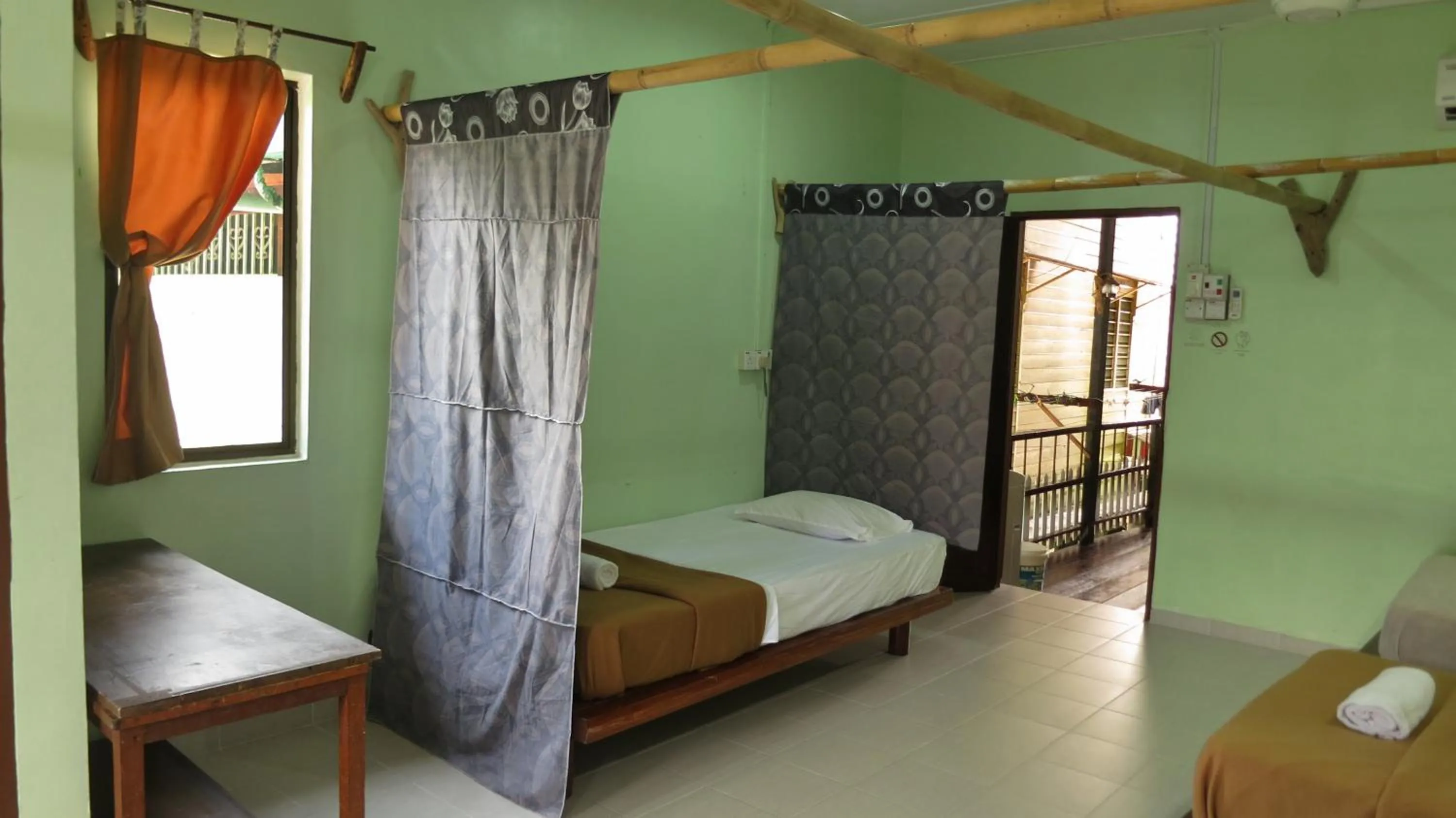 Bed in Pangkor Guesthouse SPK