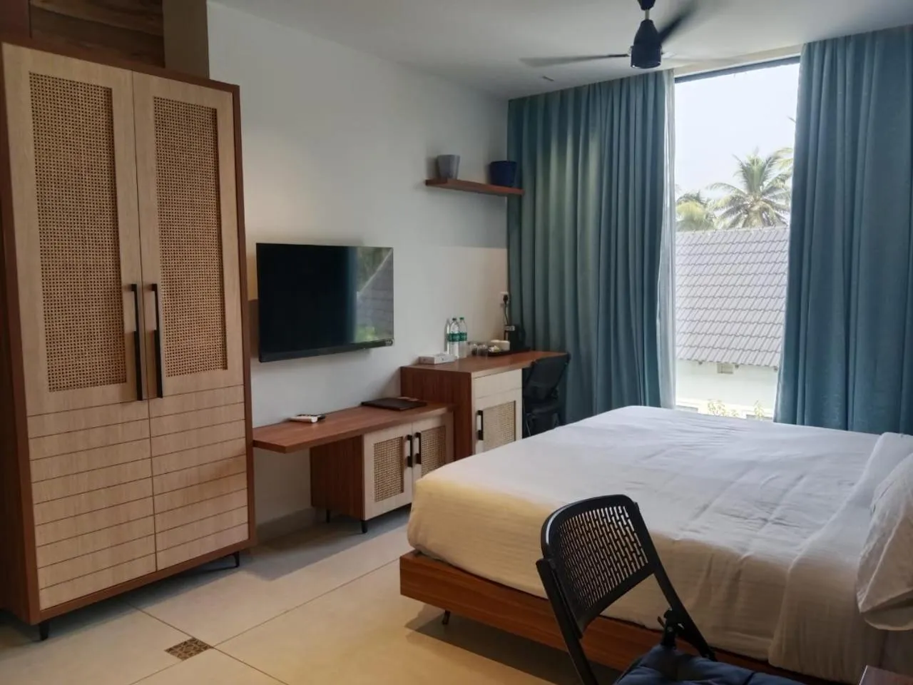 Bed in ANANSA BOUTIQUE HOTEL by The Kannur Club