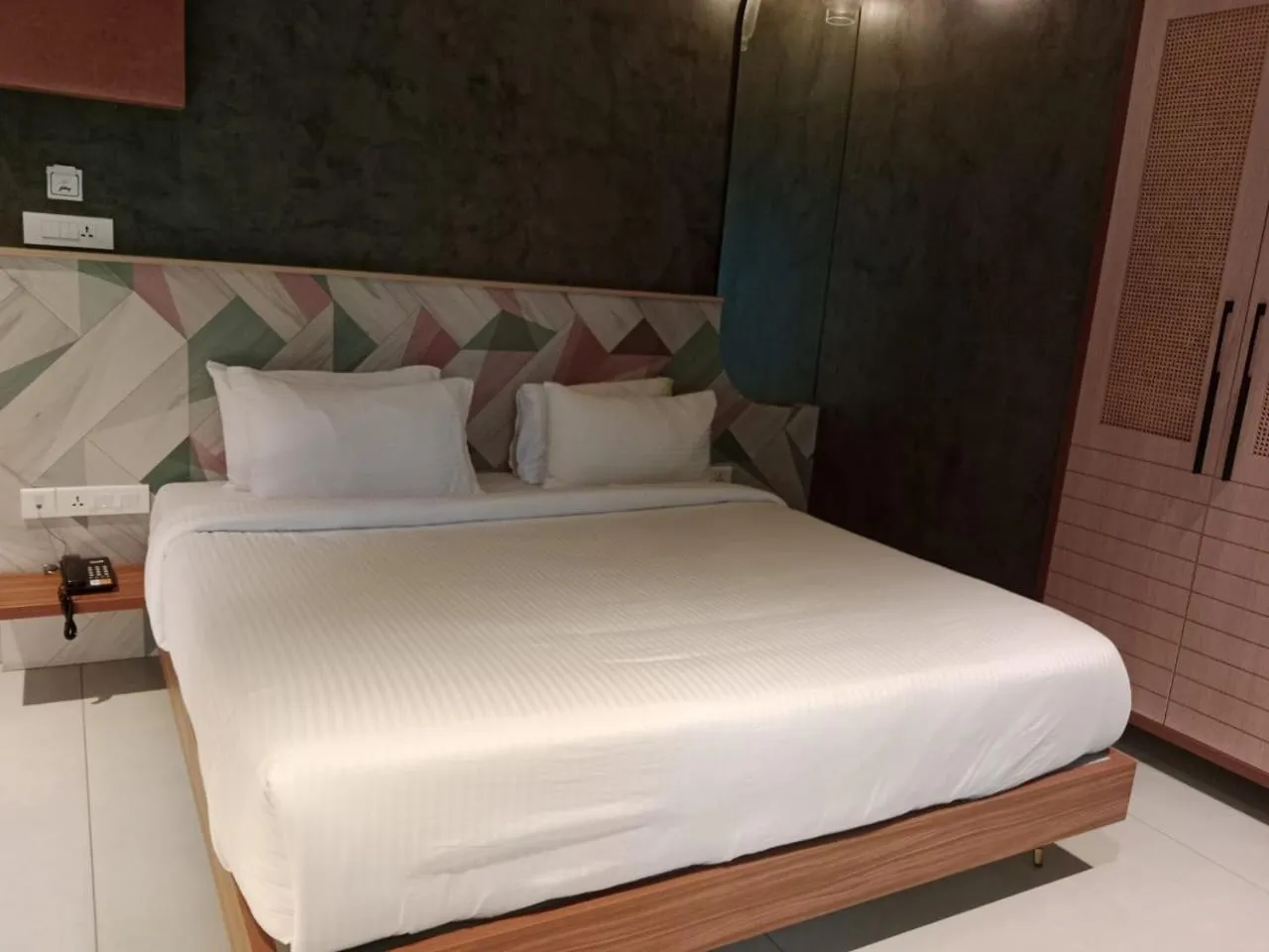 Bed in ANANSA BOUTIQUE HOTEL by The Kannur Club