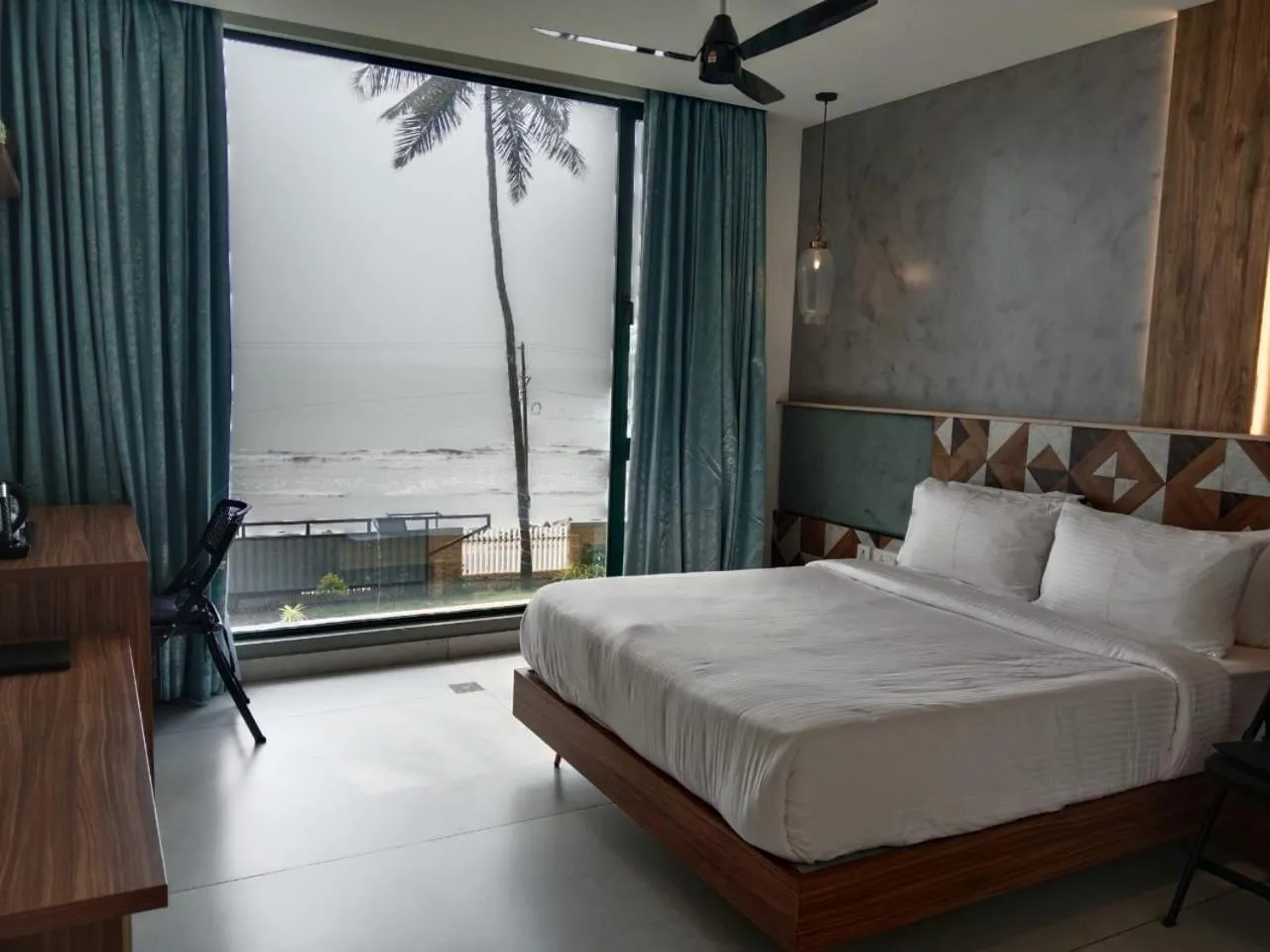 Bed in ANANSA BOUTIQUE HOTEL by The Kannur Club