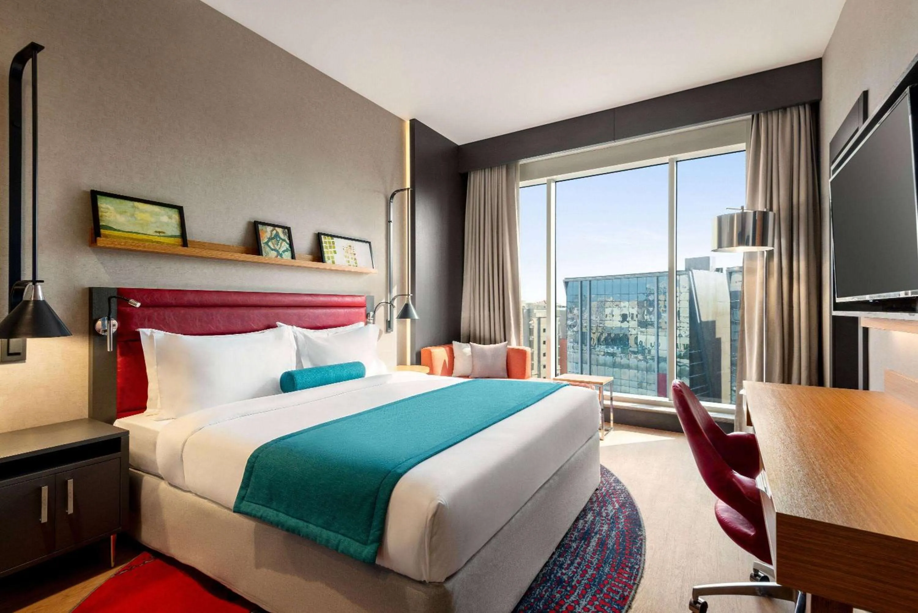 Photo of the whole room, Bed in Ramada Encore Al Khobar Corniche