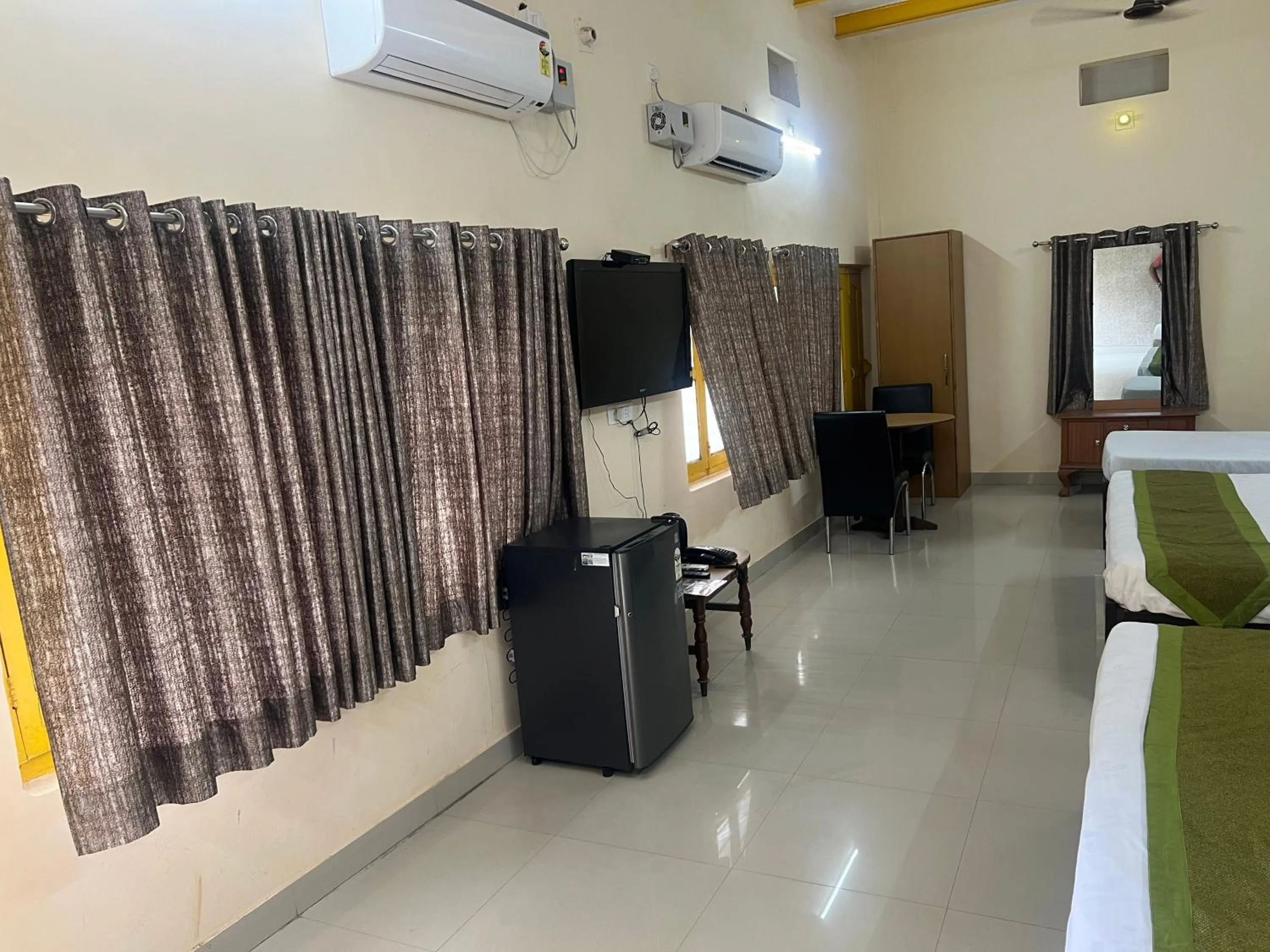 Bed in Hotel Utsav Grand