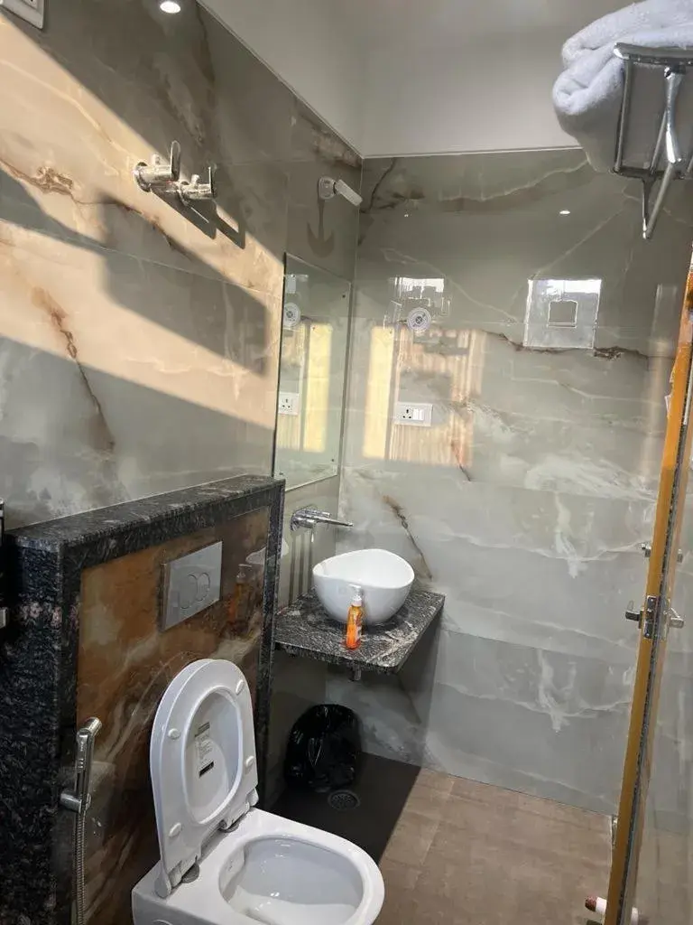 Bathroom in Hotel Utsav Grand Bathroom in Hotel Utsav Grand