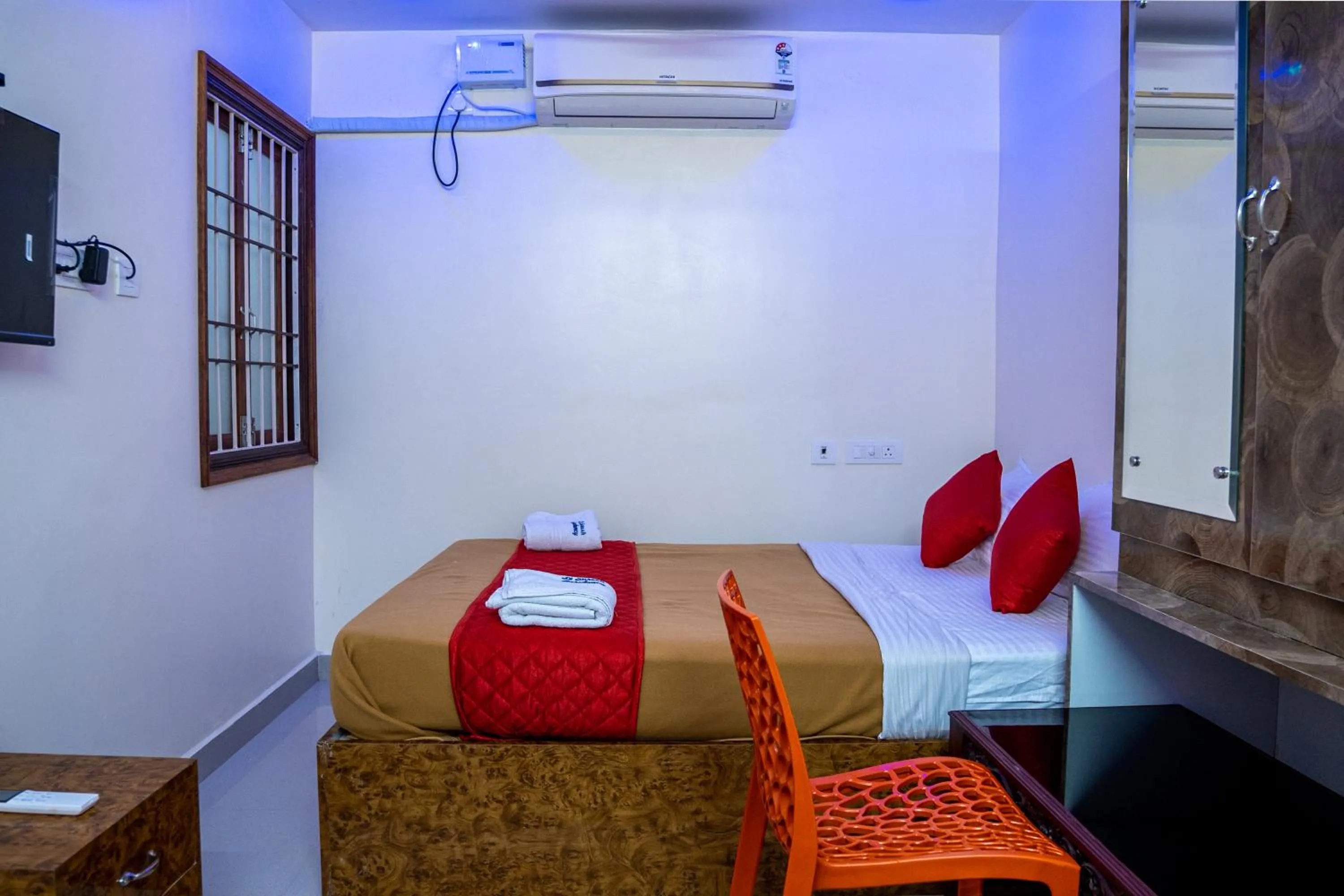 Bed in Le Suresh Guest House