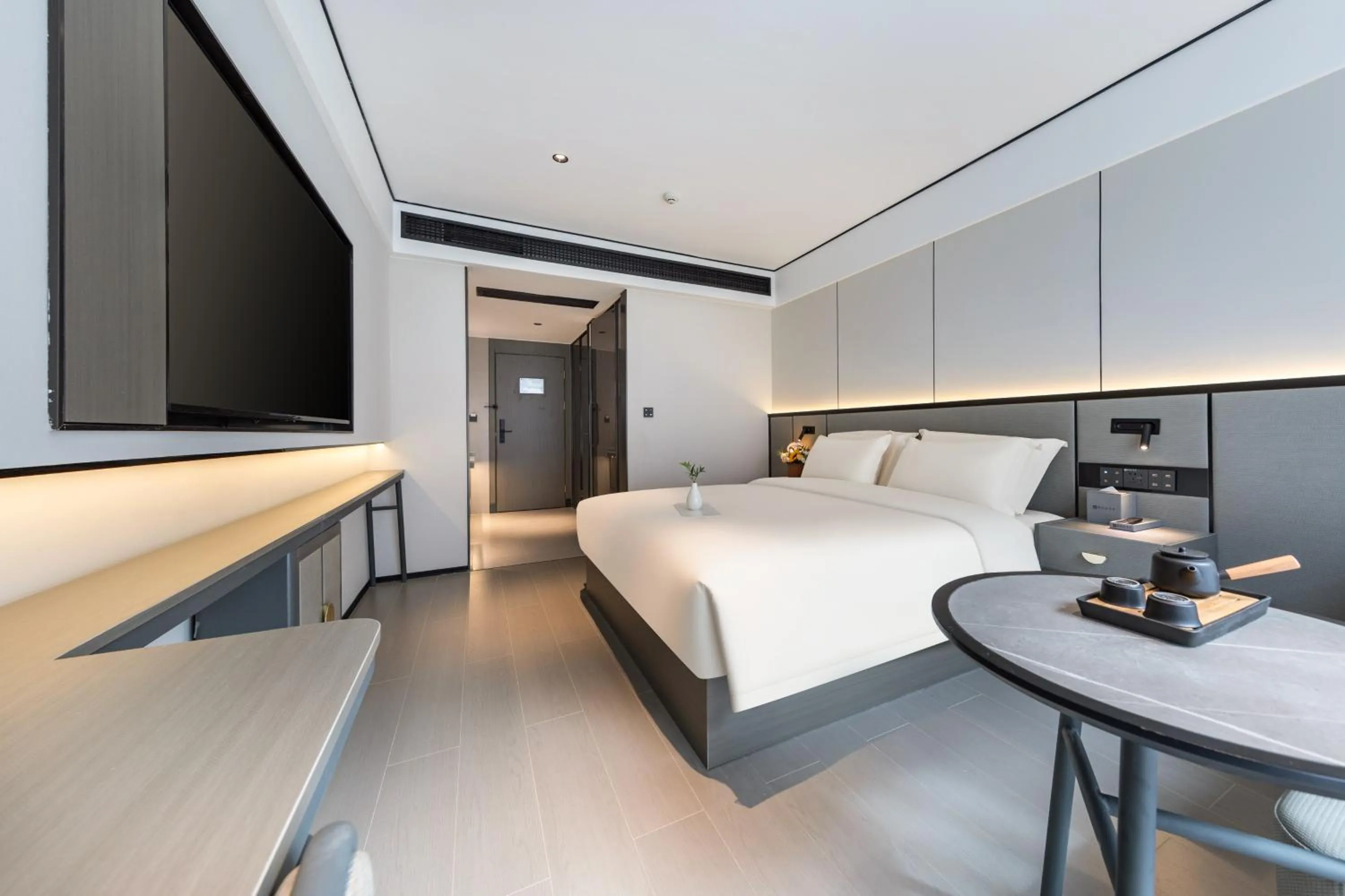 Bed in Gongxili - Xige Hotel Free Welcome Tea and Dessert