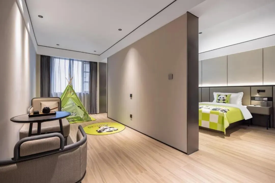 Living room, Bed in Gongxili - Xige Hotel