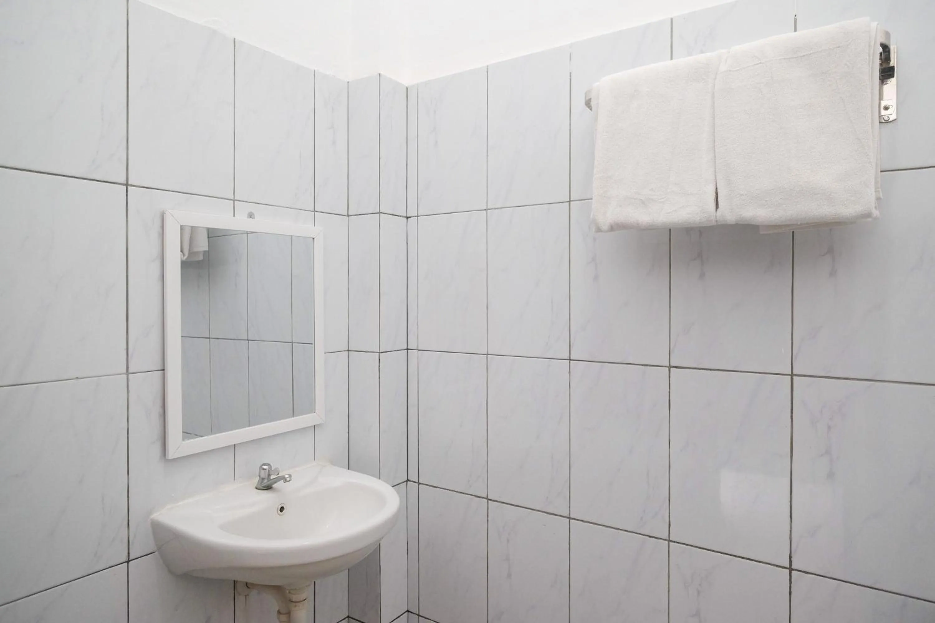 Bathroom in Urbanview Hotel LTefa Pemalang