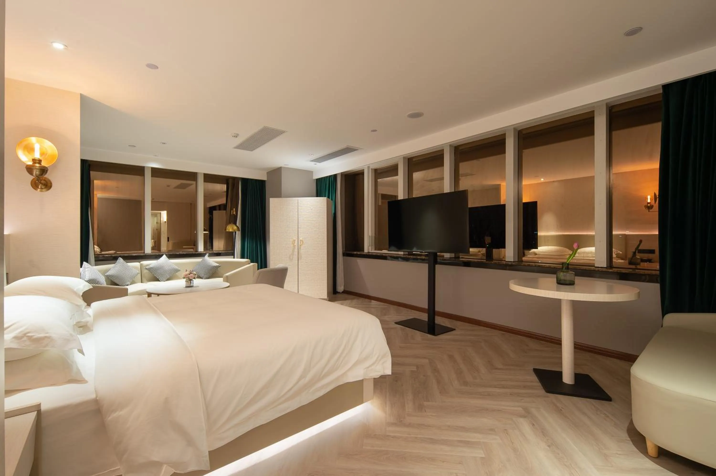Bed in ELITE International Hotel Taikoo Hui Plaza Gangding Metro Station Branch