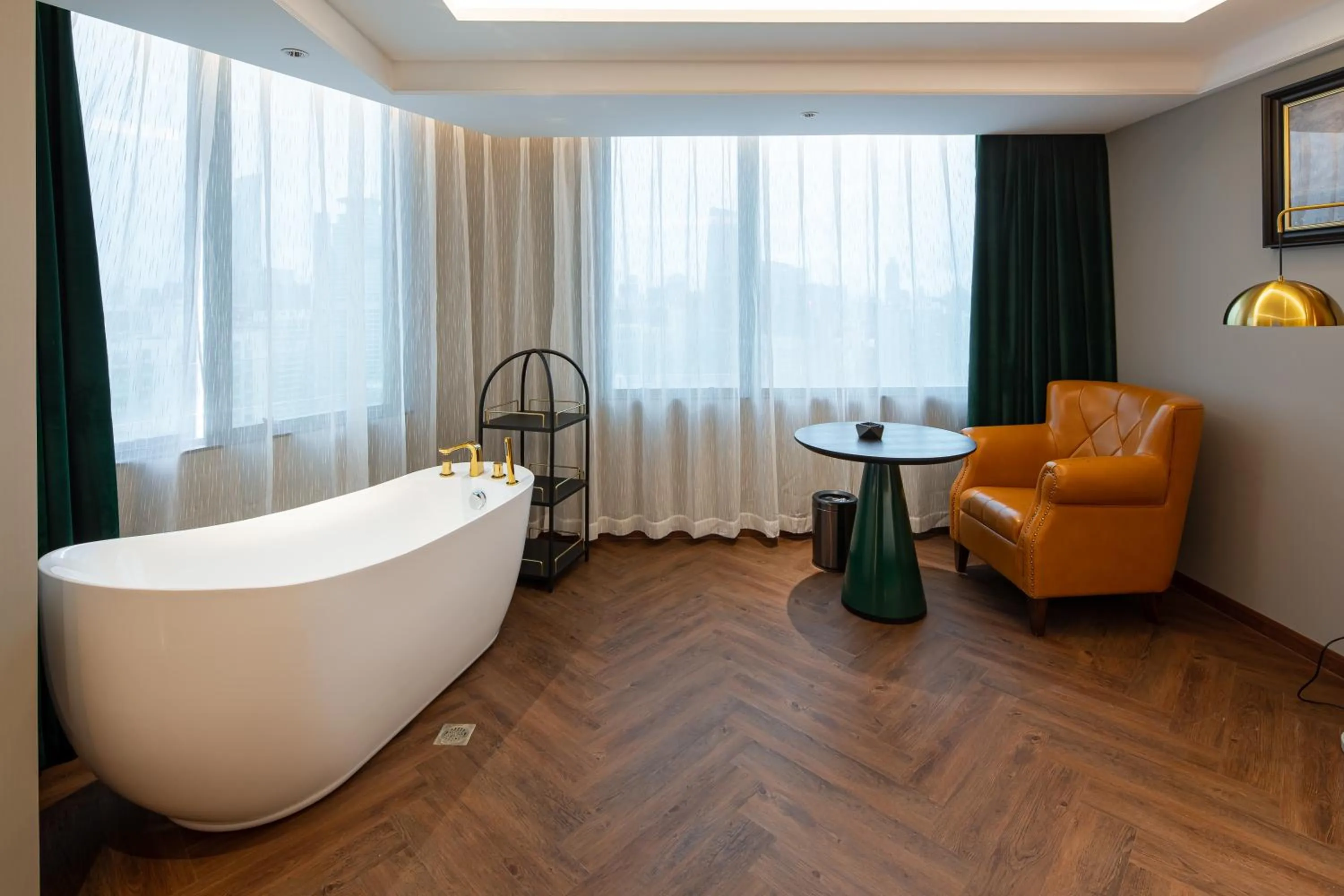 Seating area in ELITE International Hotel Taikoo Hui Plaza Gangding Metro Station Branch