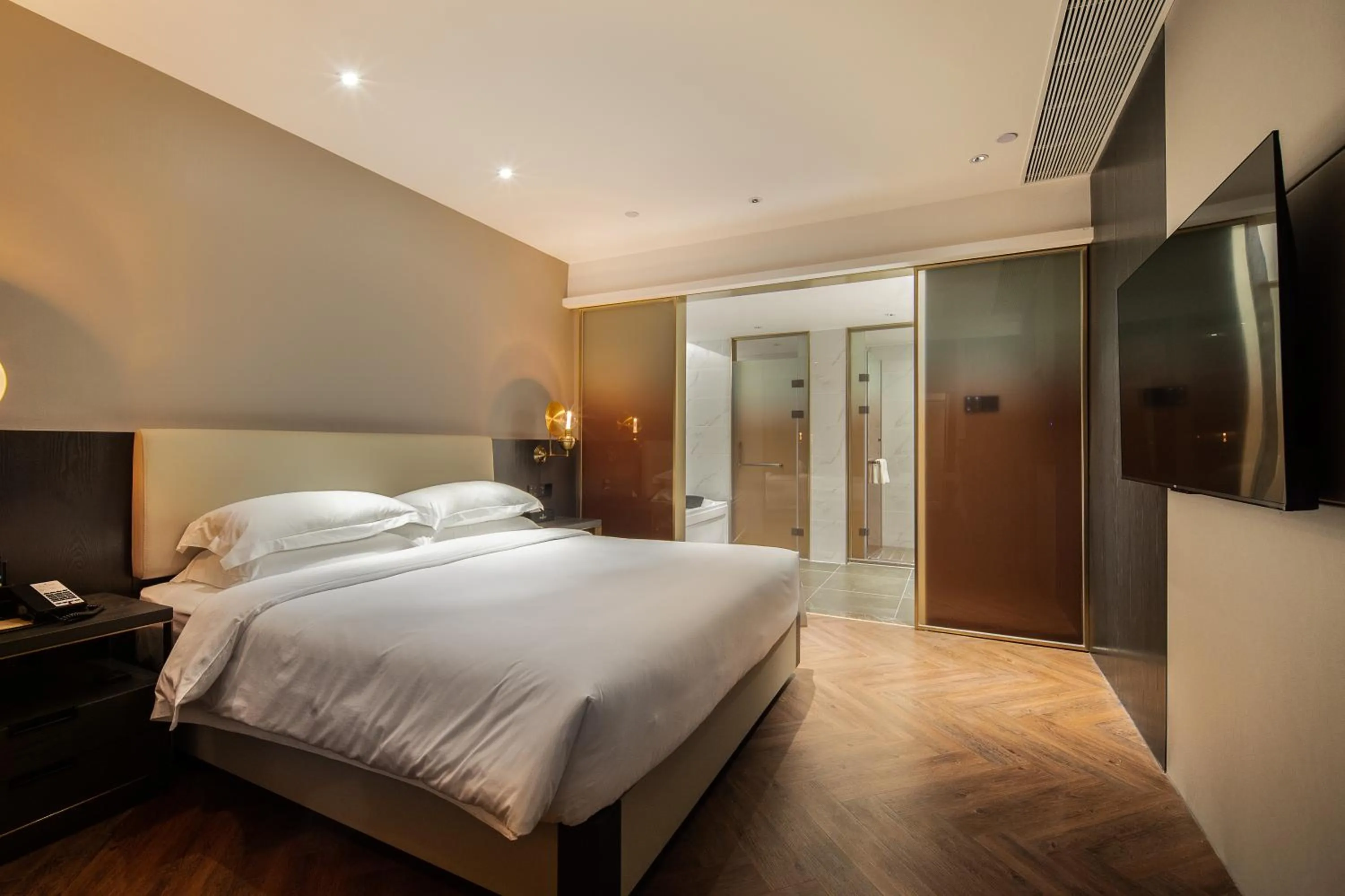 Bed in ELITE International Hotel Taikoo Hui Plaza Gangding Metro Station Branch