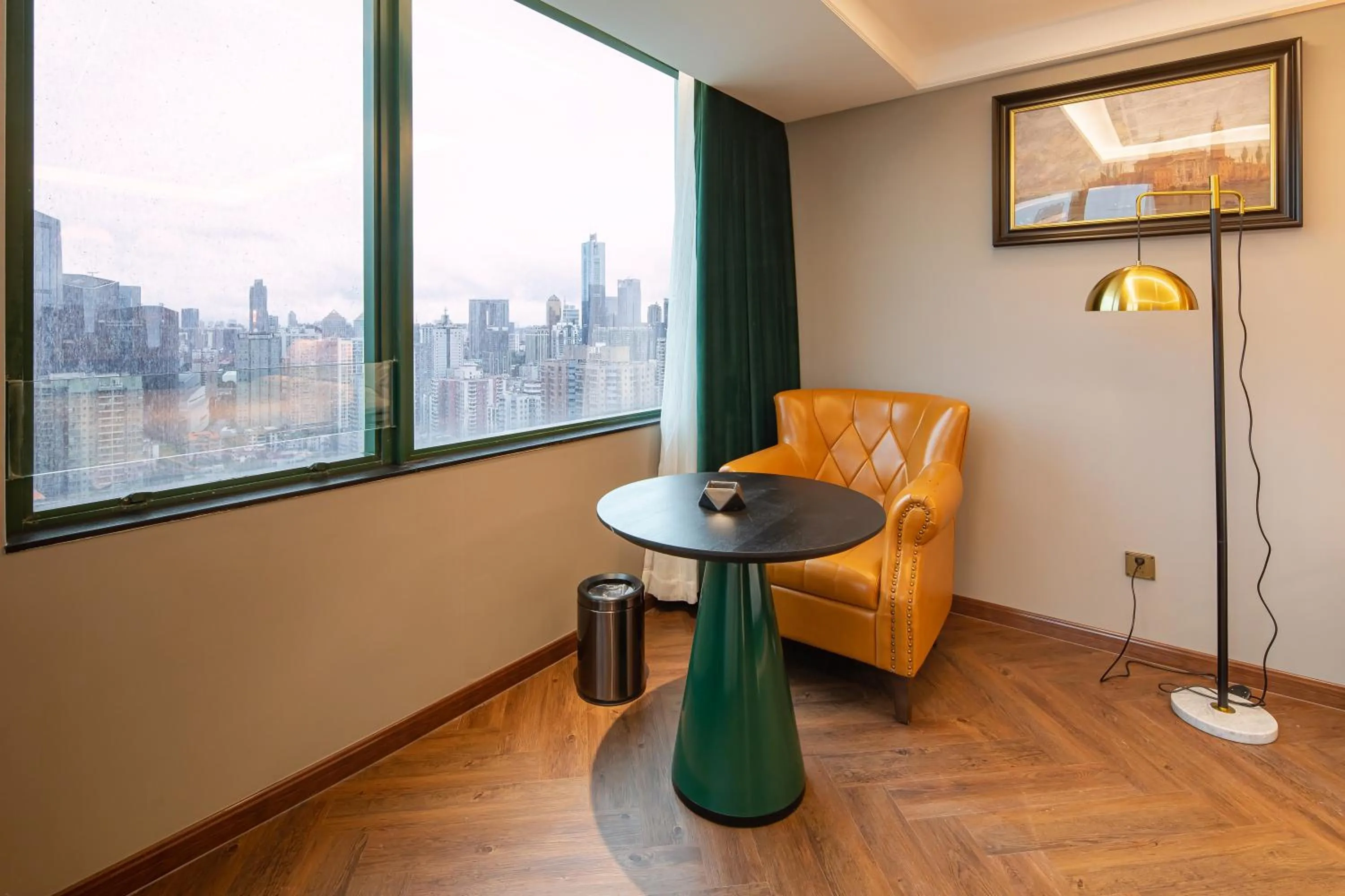 Seating area in ELITE International Hotel Taikoo Hui Plaza Gangding Metro Station Branch